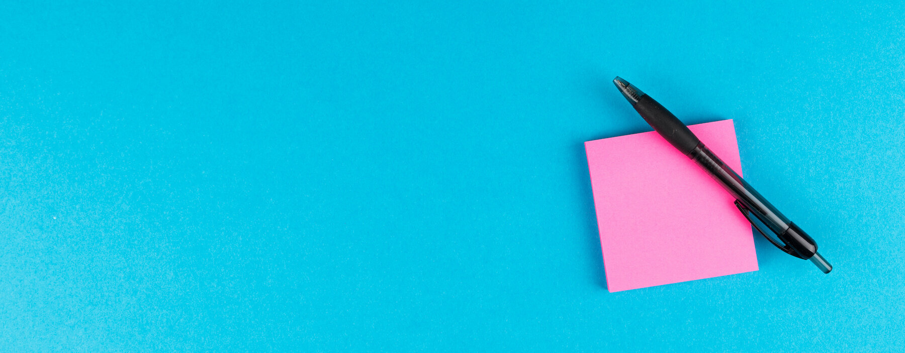 panorma with pen and post it on colorful background