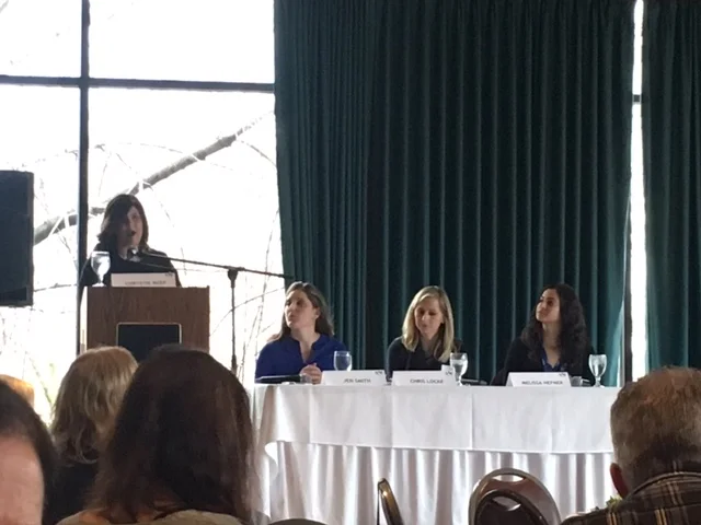 Chrystie Reep leads the panel discussion.