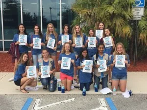 Girl Scout Troop #10717, with I Care books