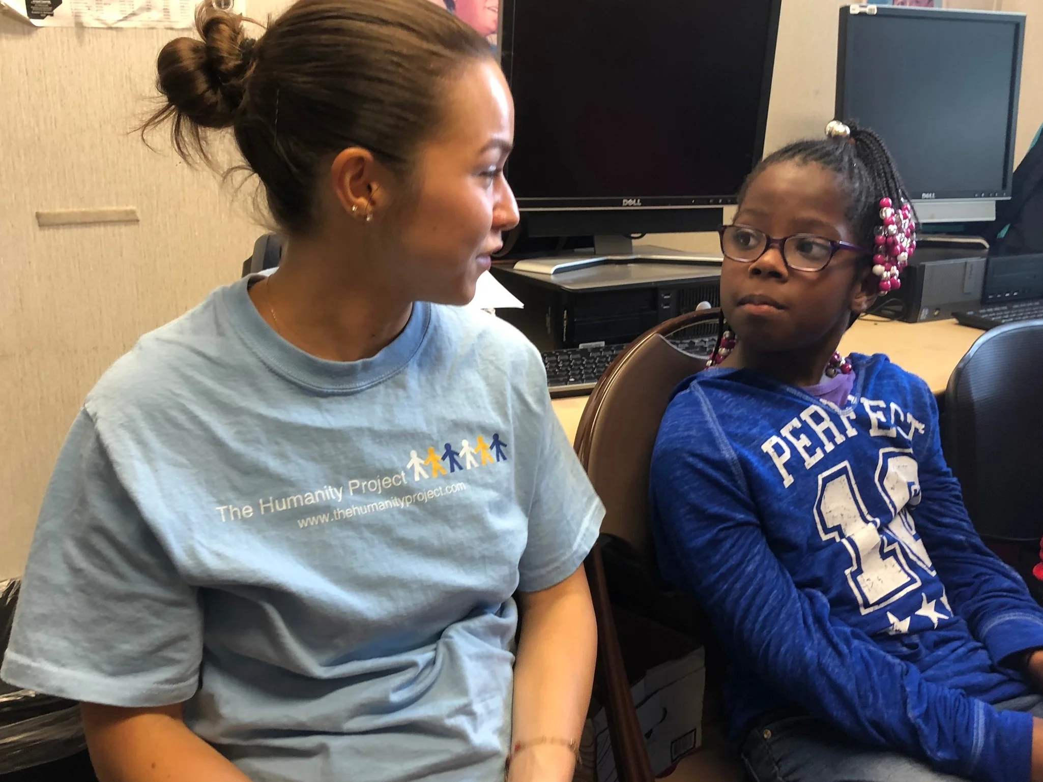 Our great summer intern, Noel Murray, with one of the girls
