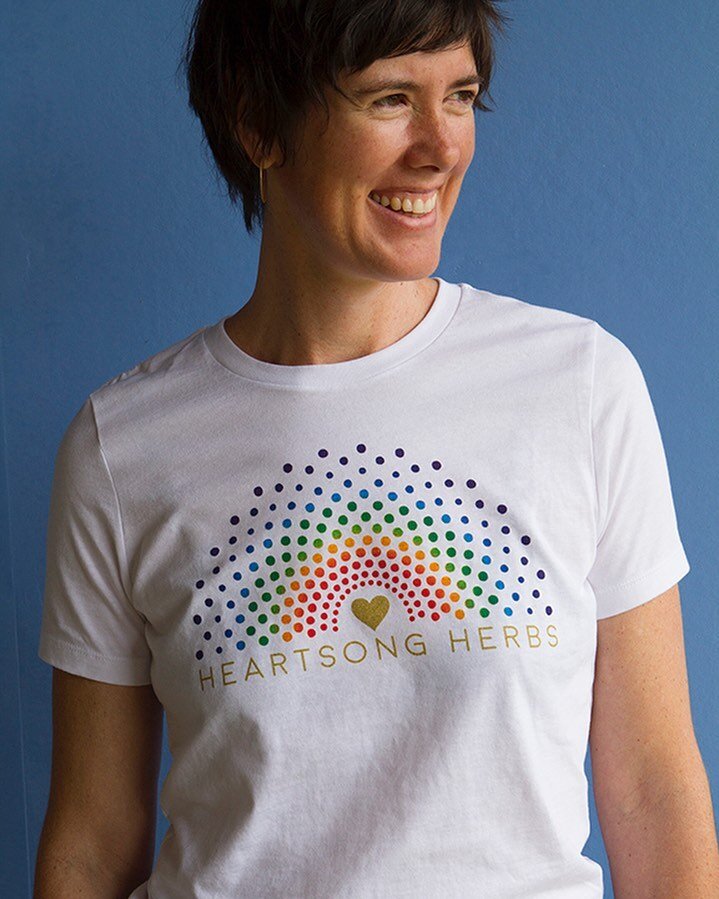 We made shirts!🌈 And we&rsquo;ll be throwing one into every order over $100 for the next week. These shirts were made in the USA on 100% cotton and locally screen printed by @satisfactoryshopcat Go get you one🌈

#heartsong #herbs #tshirt #rainbows 