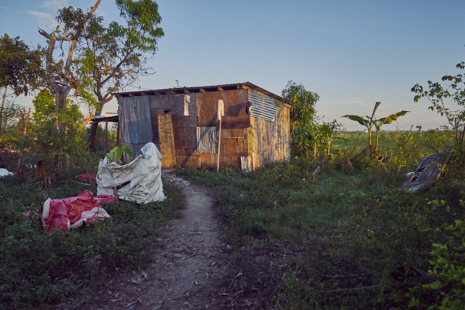 The pastor's home, rebuilt from pieces of the church's damaged roof.