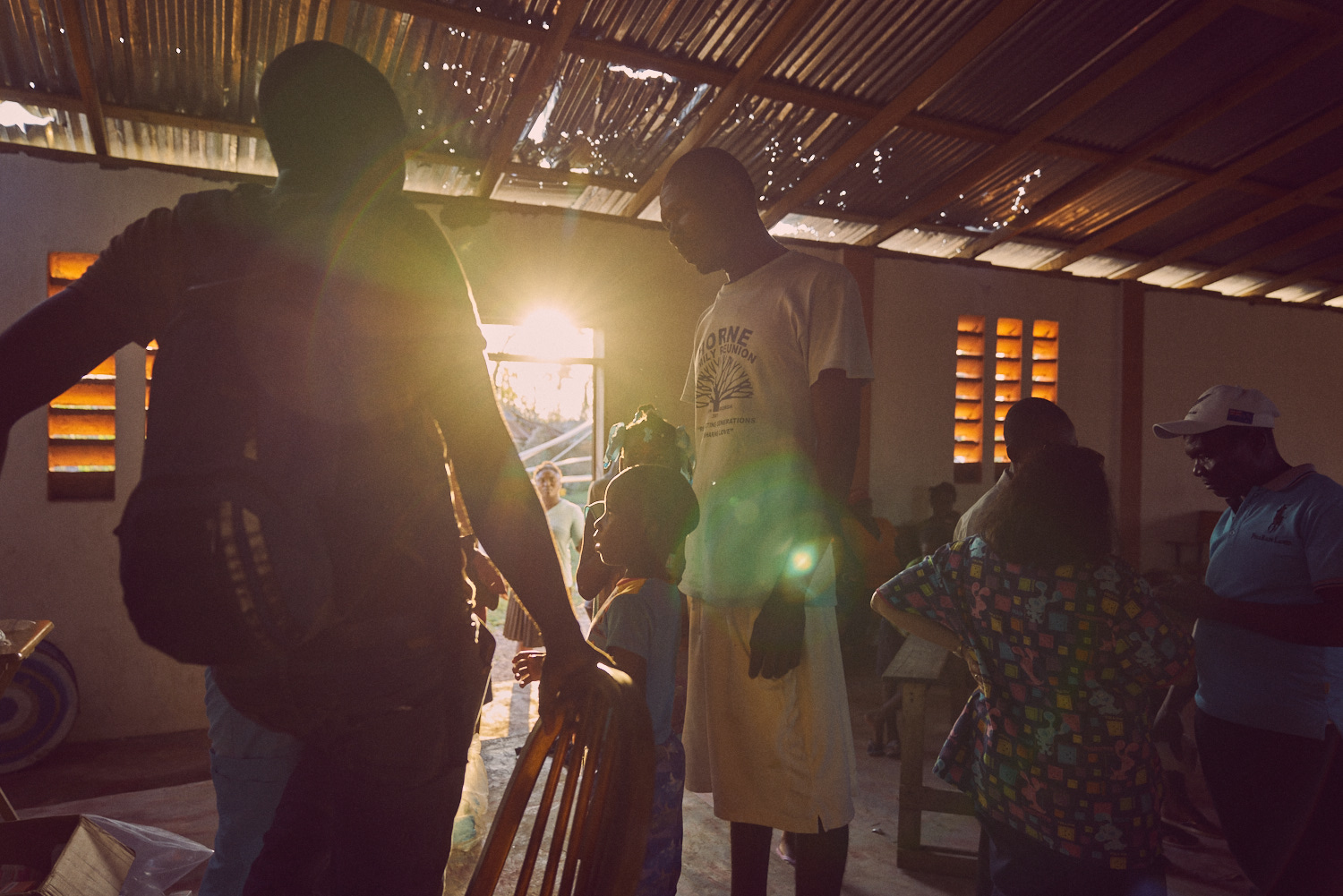 A family receiving medicine after a consultation with an ATR medical practitioner.