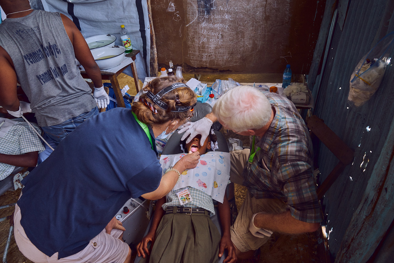 MaryJane (left) and husband Kevin (right) perform a standard cleaning.