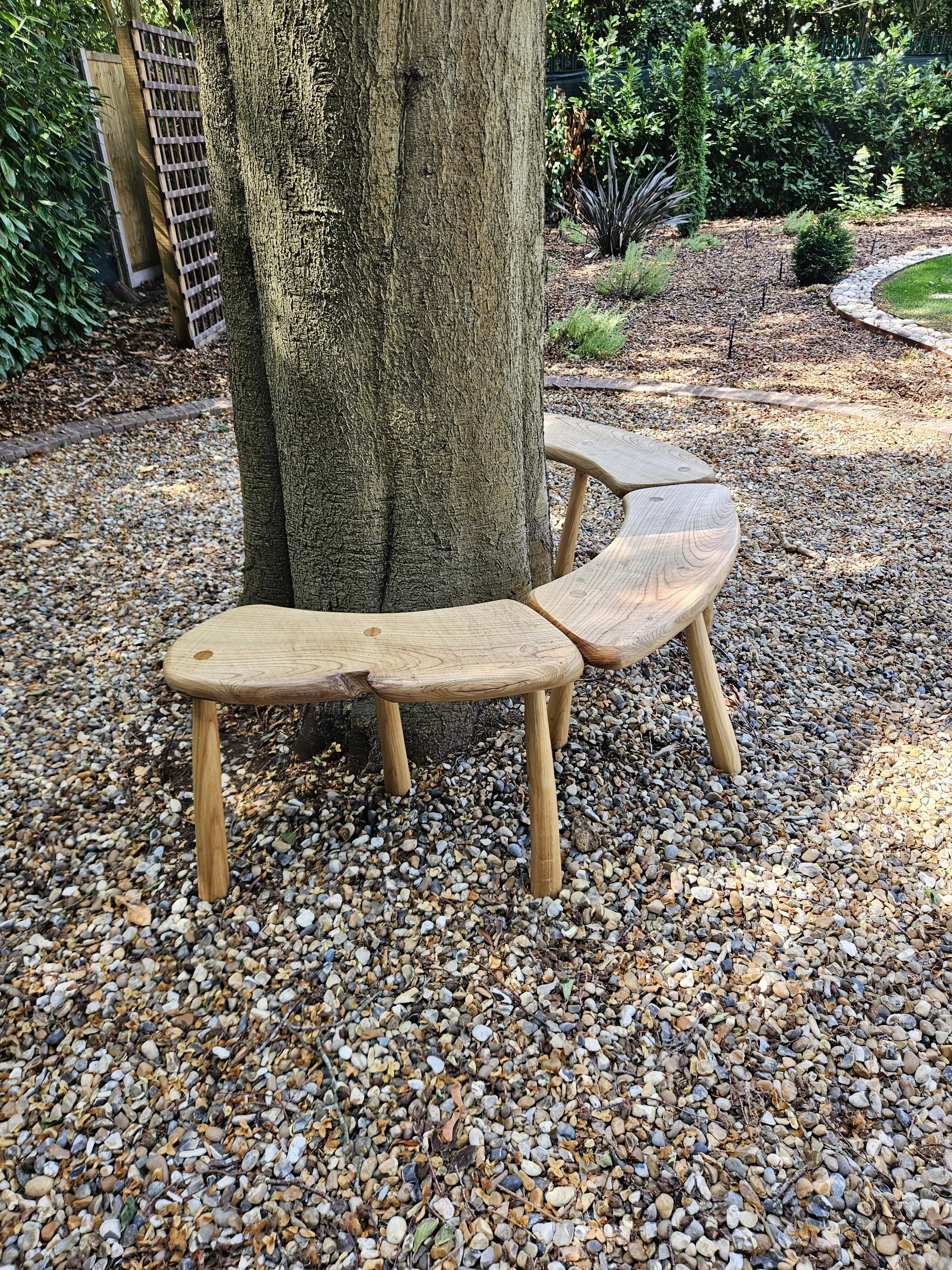 Wrap-around tree bench, handmade by Peter Lanyon Furniture