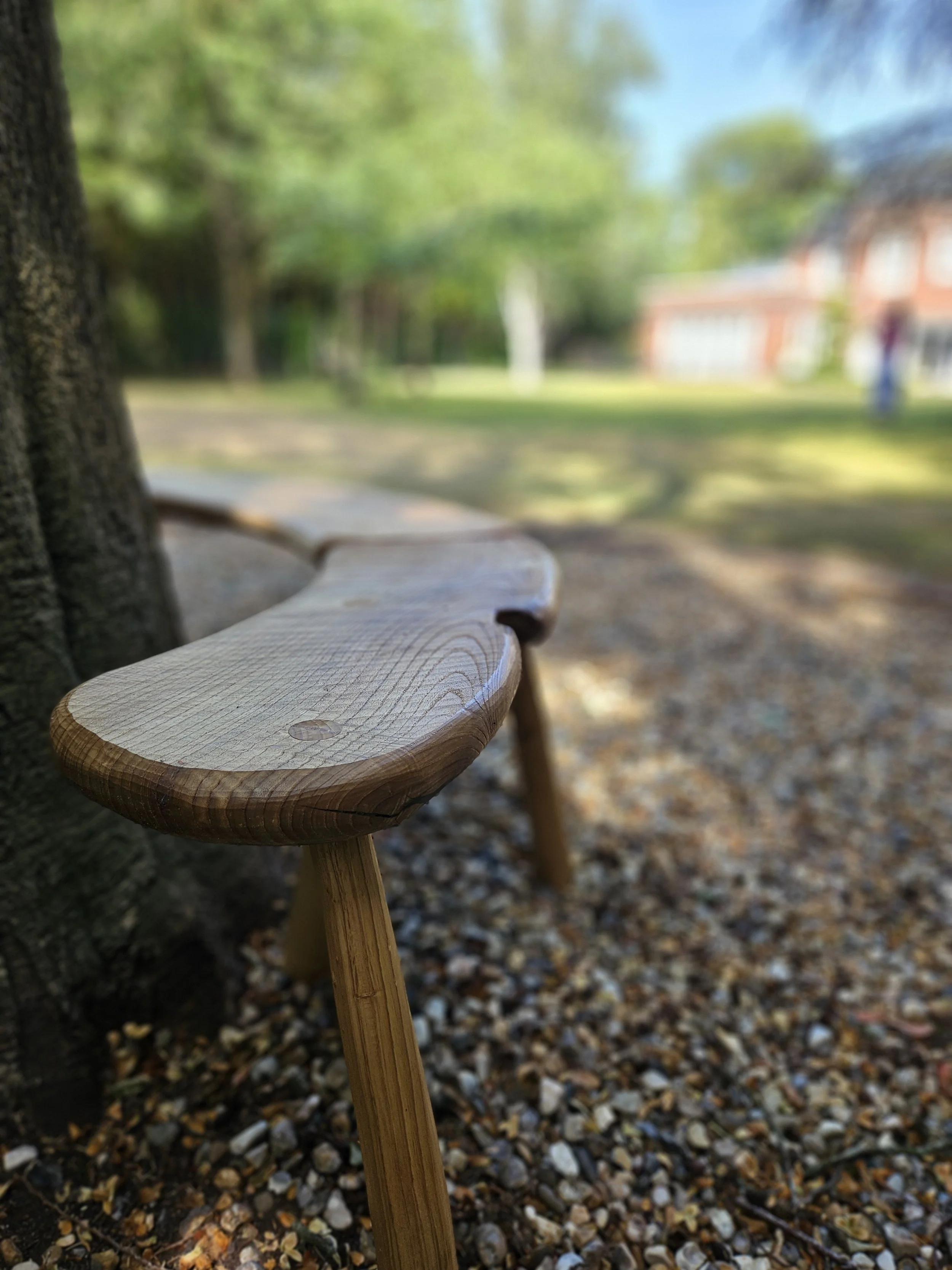 Tree bench showing detailing of tactile edges.