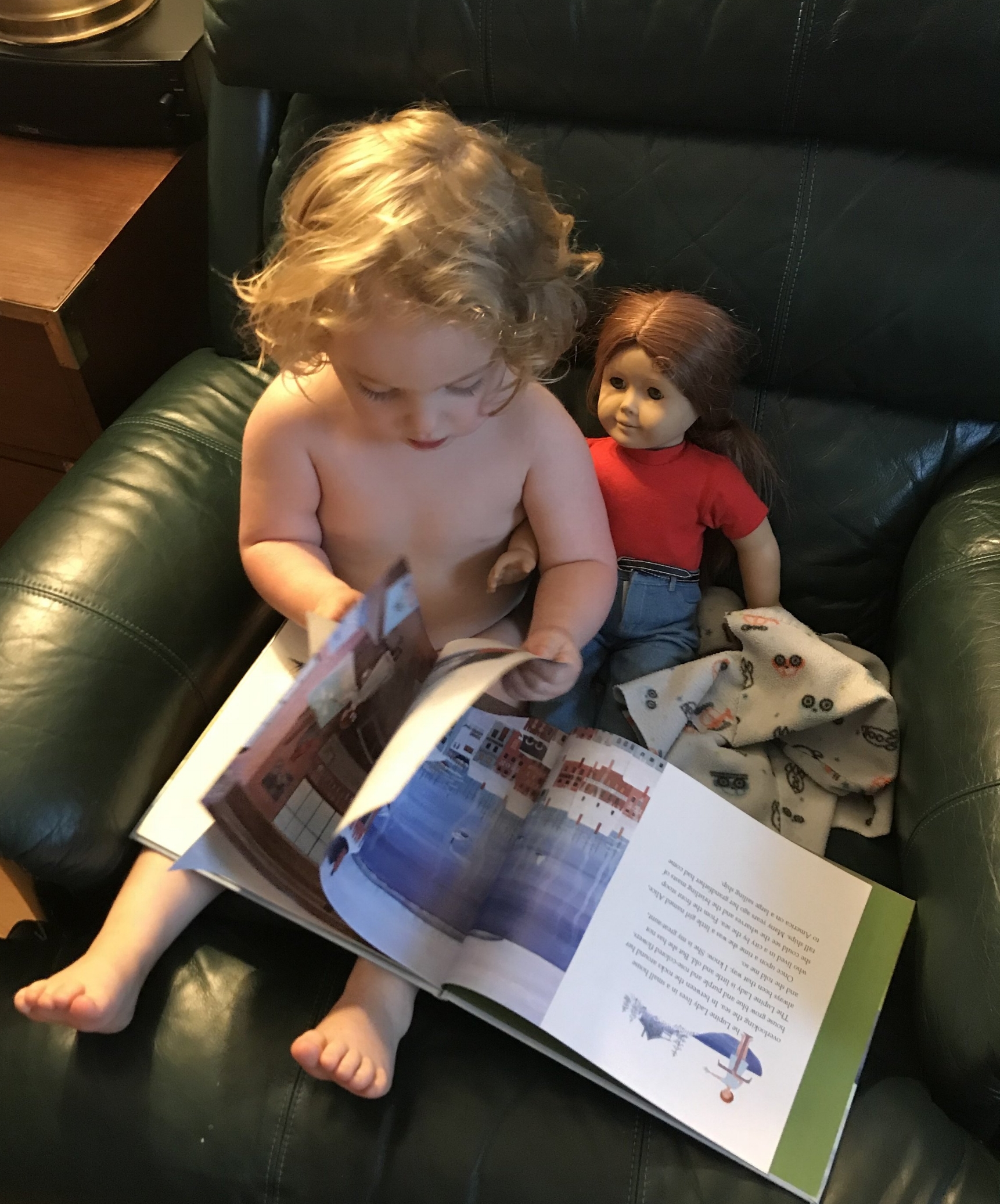 She is contentedly and independently reading a book to one of my former dolls. If every minute were like this, I wouldn’t need a confidence journal.