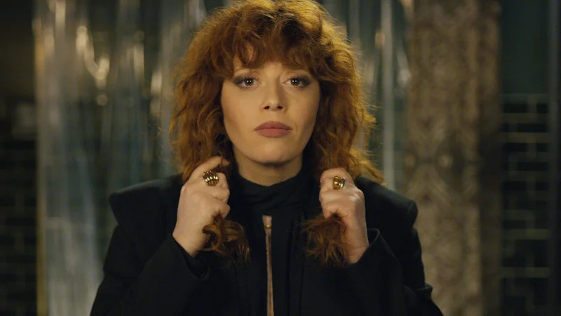 Natasha Lyonne in Netflix’s Russian Doll . Her hair. Her eyes. Her high-collared, shoulder-padded wonders.
