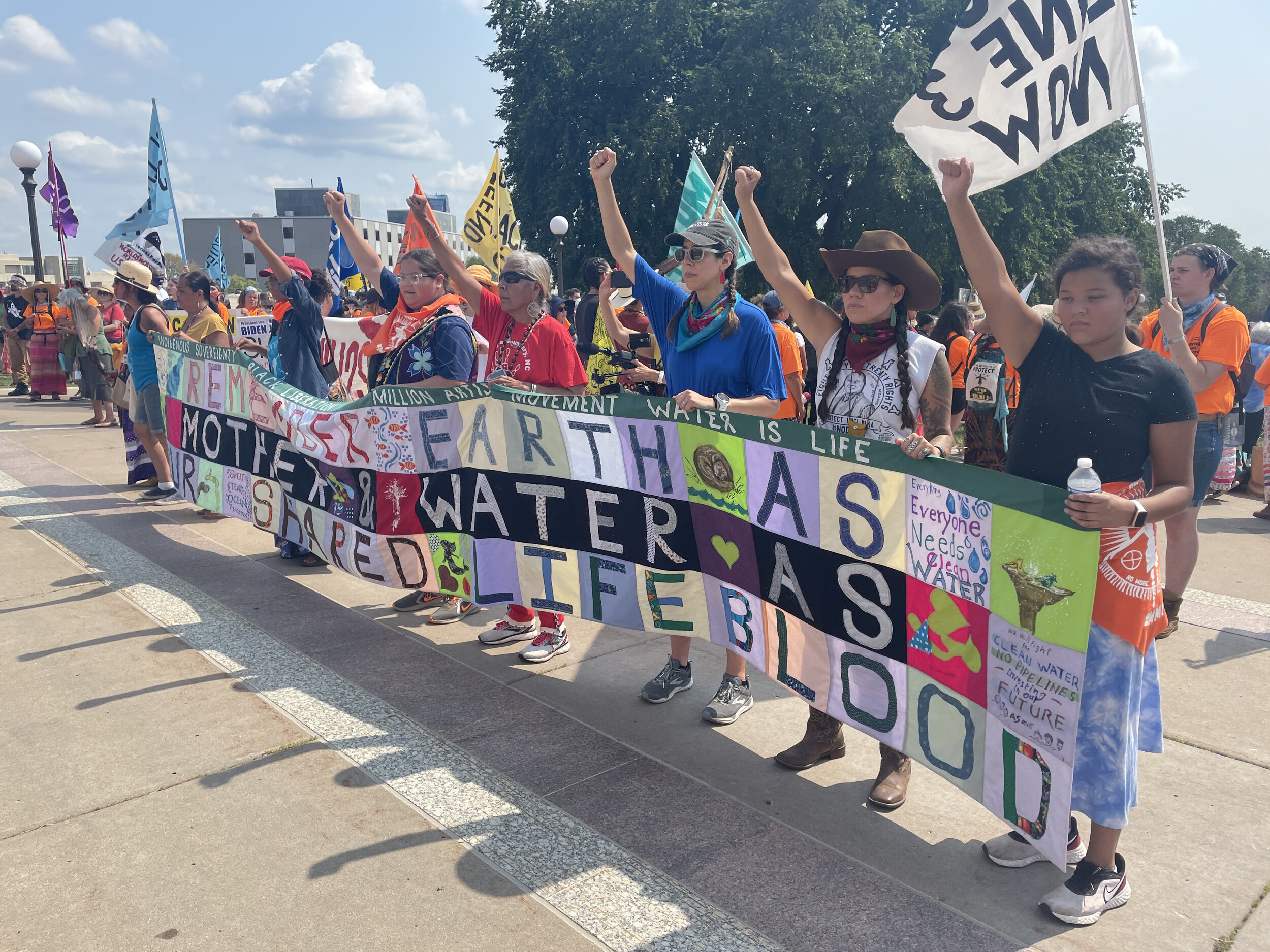 On August 25, 2021, Amber helped carry the banner that led the #StopLine3 march of 1000+ people to the MN State Capitol