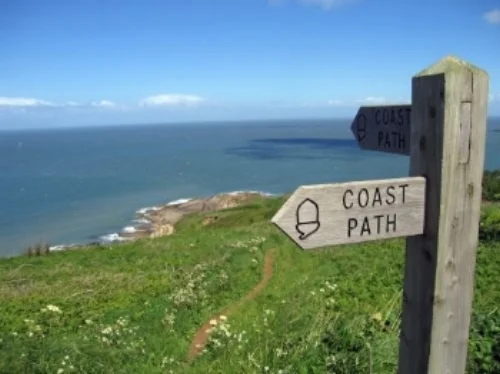 Take a stroll along the coast path next to our park to admire the views