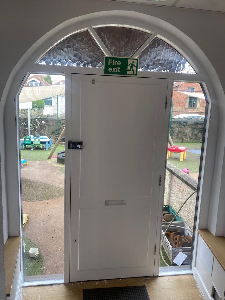 Re-glaze arched entrance door