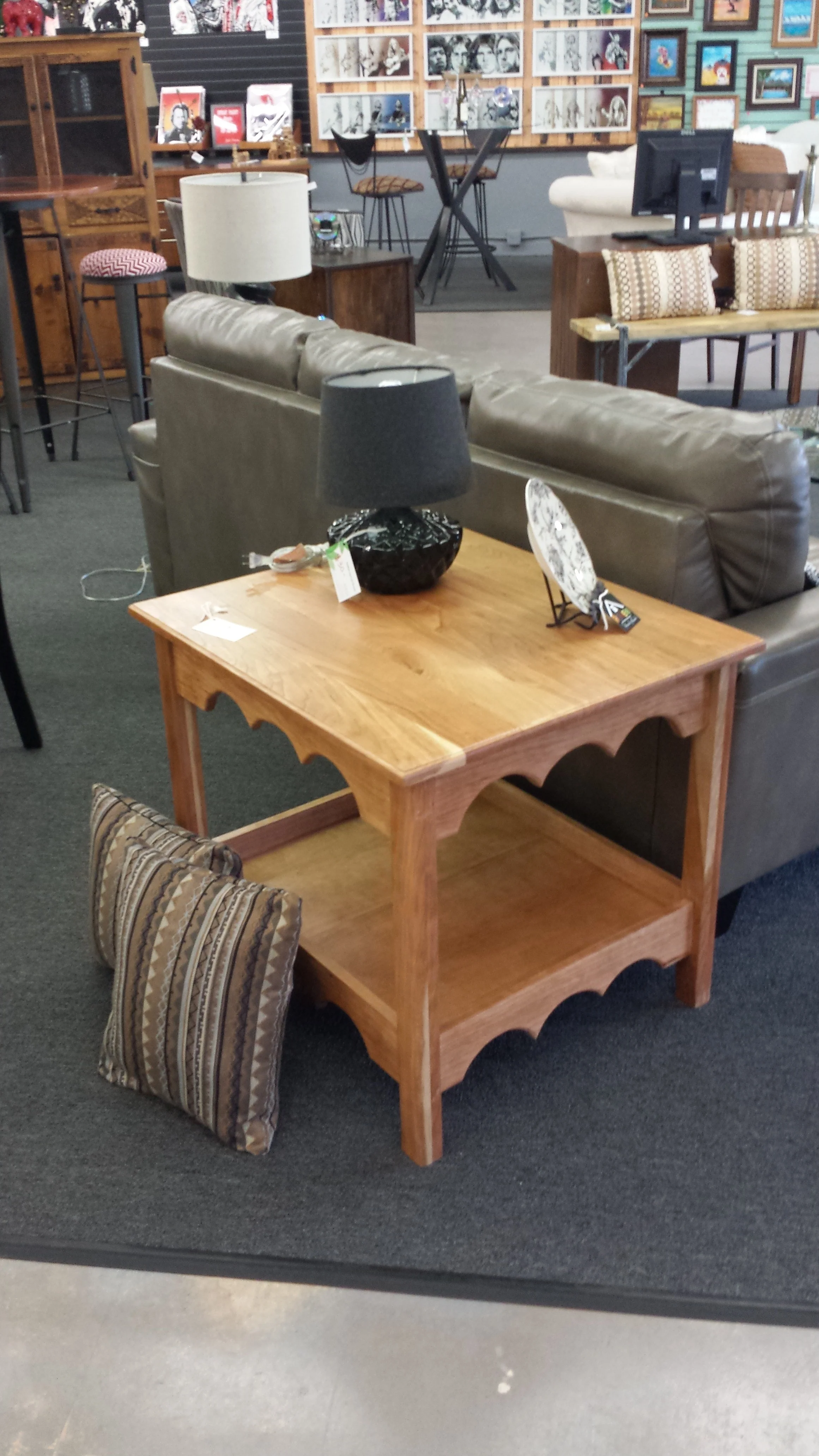 Customizing furniture is one of my passions by incorporating different woods. I visualize unfinished wood and place my signature on it. The construction is made to last by using processes like joinery. The picture above is a side table made from cherry wood (currently being displayed at Blue Chair located on Broadway in Denver.) The black shelf below is made from pine and stained with Jacobean stain is also on display in my own retail space with other masterpieces.