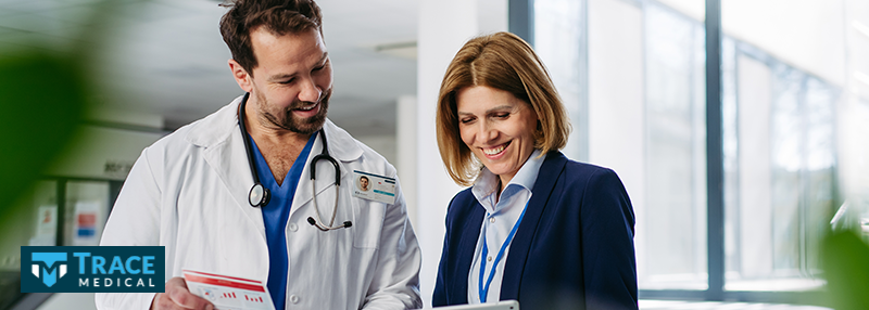 Doctor and administrator having a conversation
