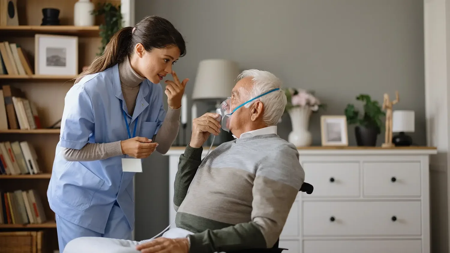 Home care clinician visiting with an older patient at home