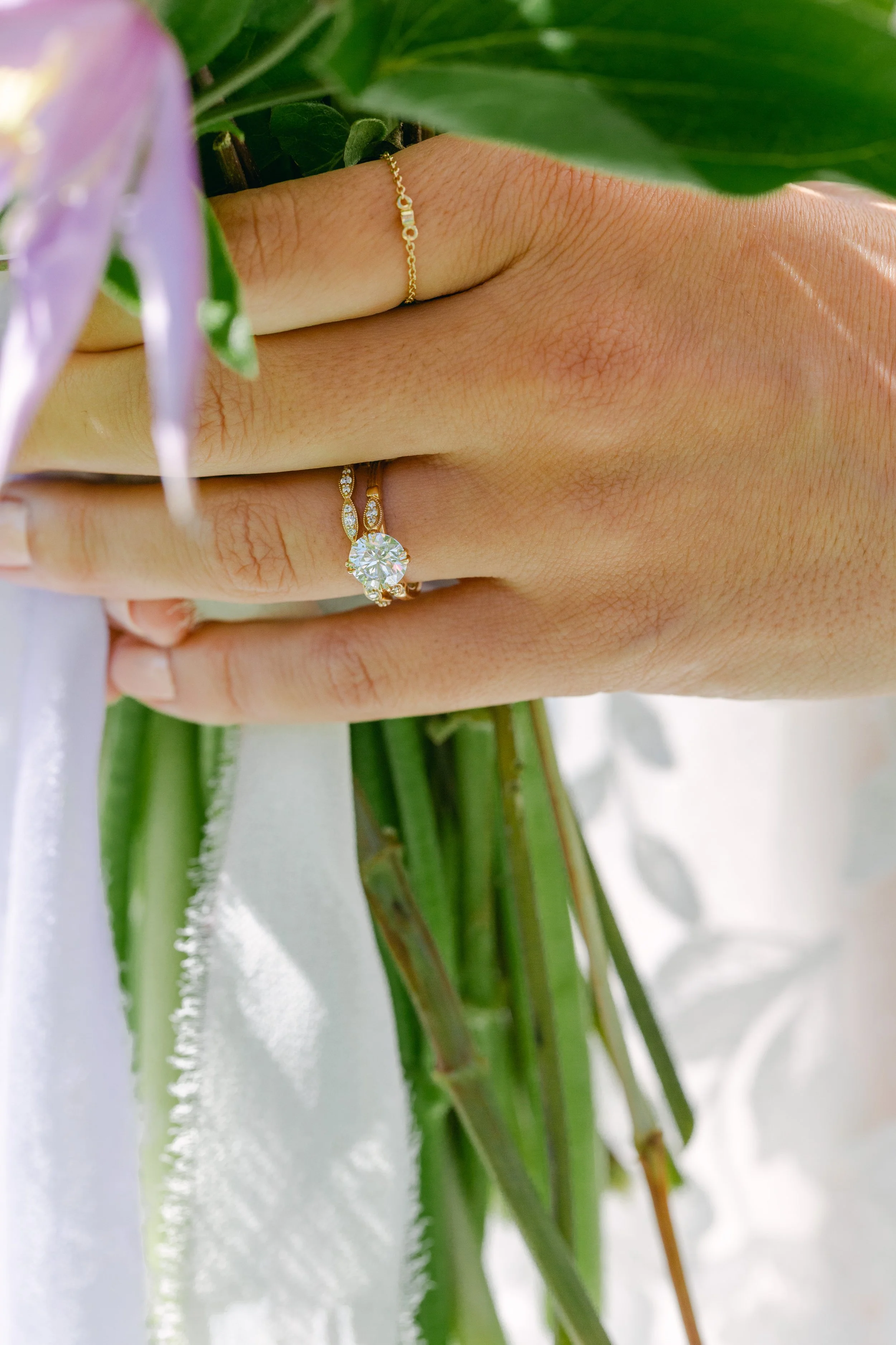 A bride's crowning moment with her custom made wedding ring set in 14k gold, with diamonds by Lady Cromer Jewelry