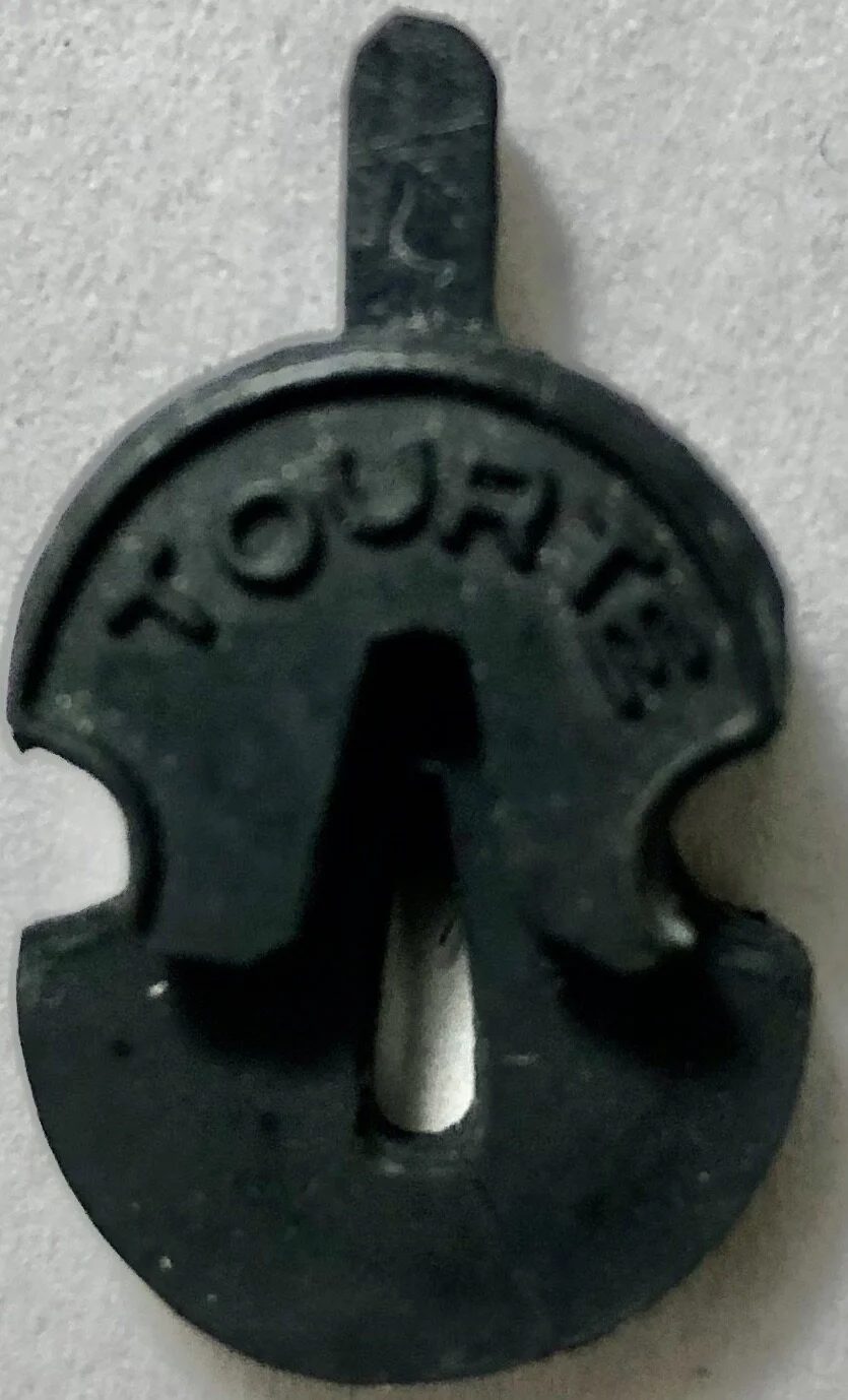 Tourte one hole mute.jpeg