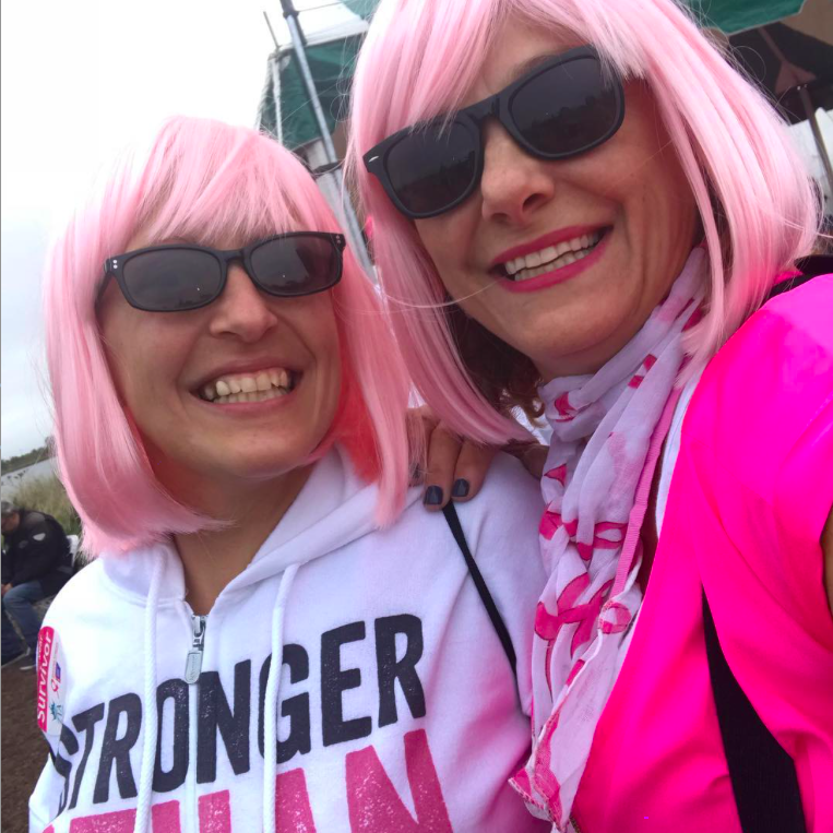Barbara and a friend rocking their pink wigs at a Breast Cancer Research Walk.