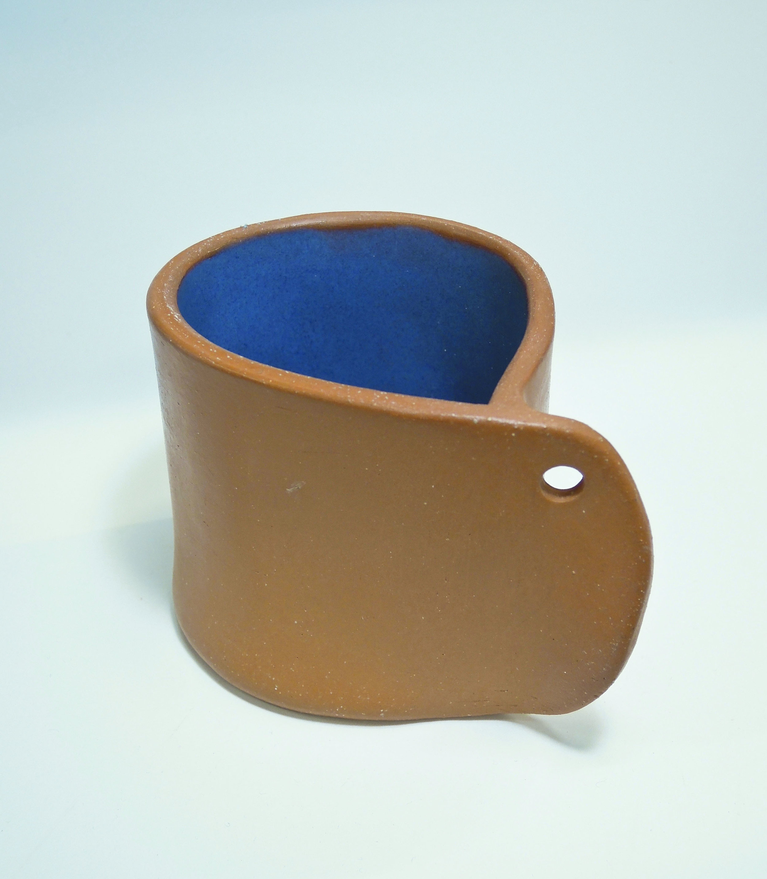    Terra cotta mug burnished, waxed with blue interior glaze 2019   