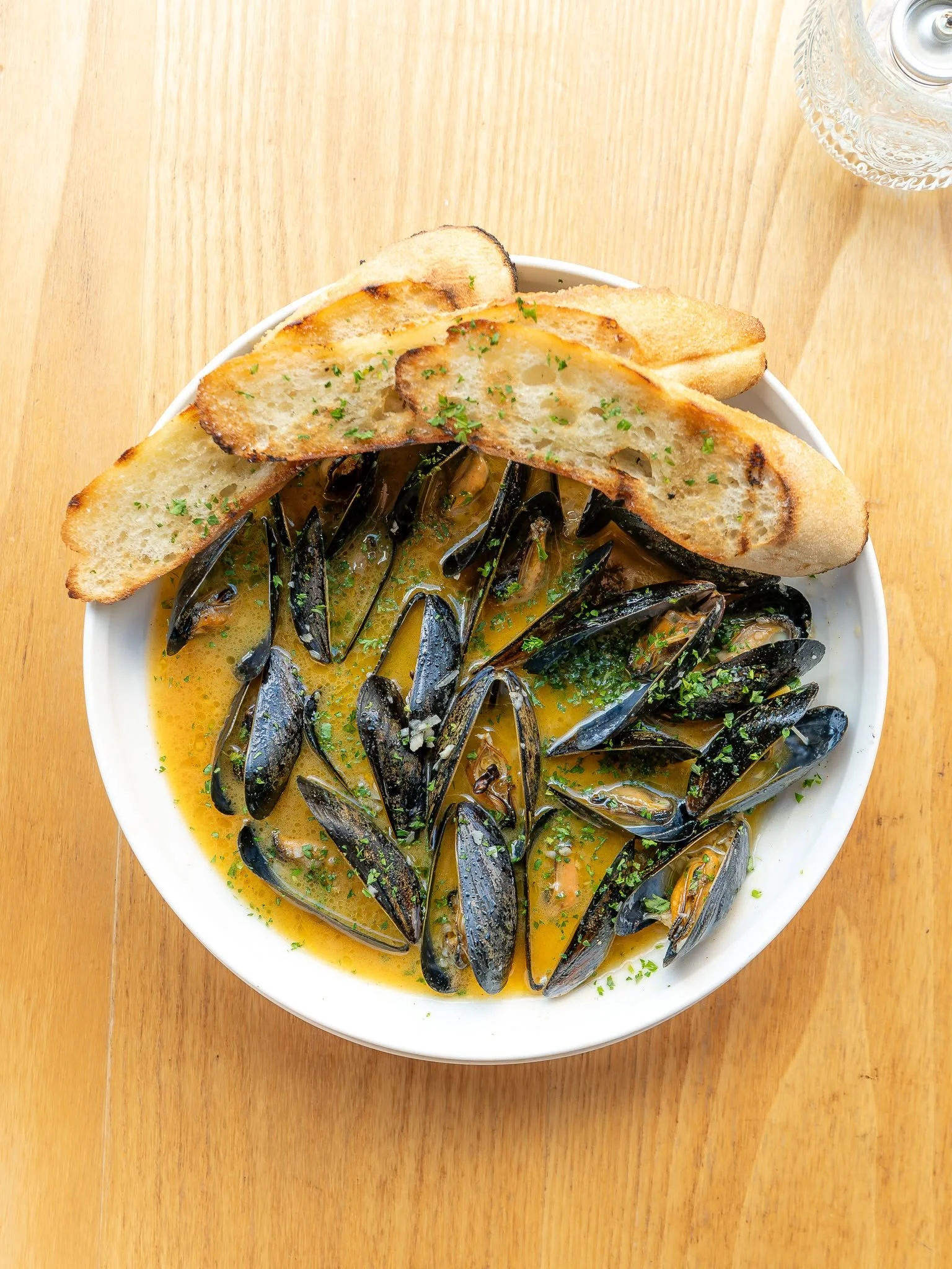 PEI mussels in chili pepper butter with grilled bread at Moxy in Portsmouth, NH