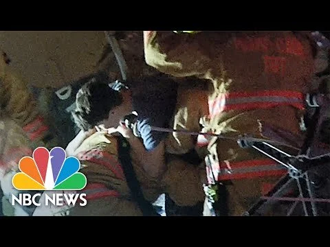 See Firefighters Rescue Boy From Collapsed Condo Building Near Miami Beach