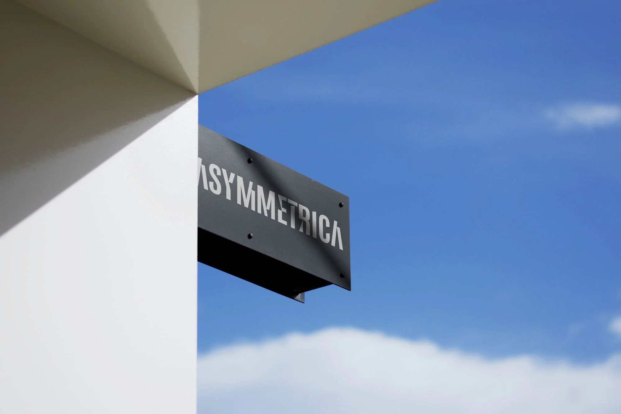 Asymmetrica logo on exterior signage