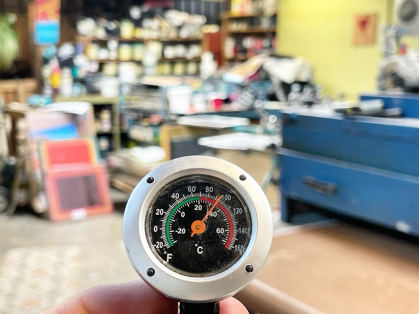 Hit at least 96 F in the shop today. This was after the oven cooled down and as the room was airing out. Pressure was on printing a halftone with water based ink in this heat but the job went smoothly thankfully. Not recommended though.