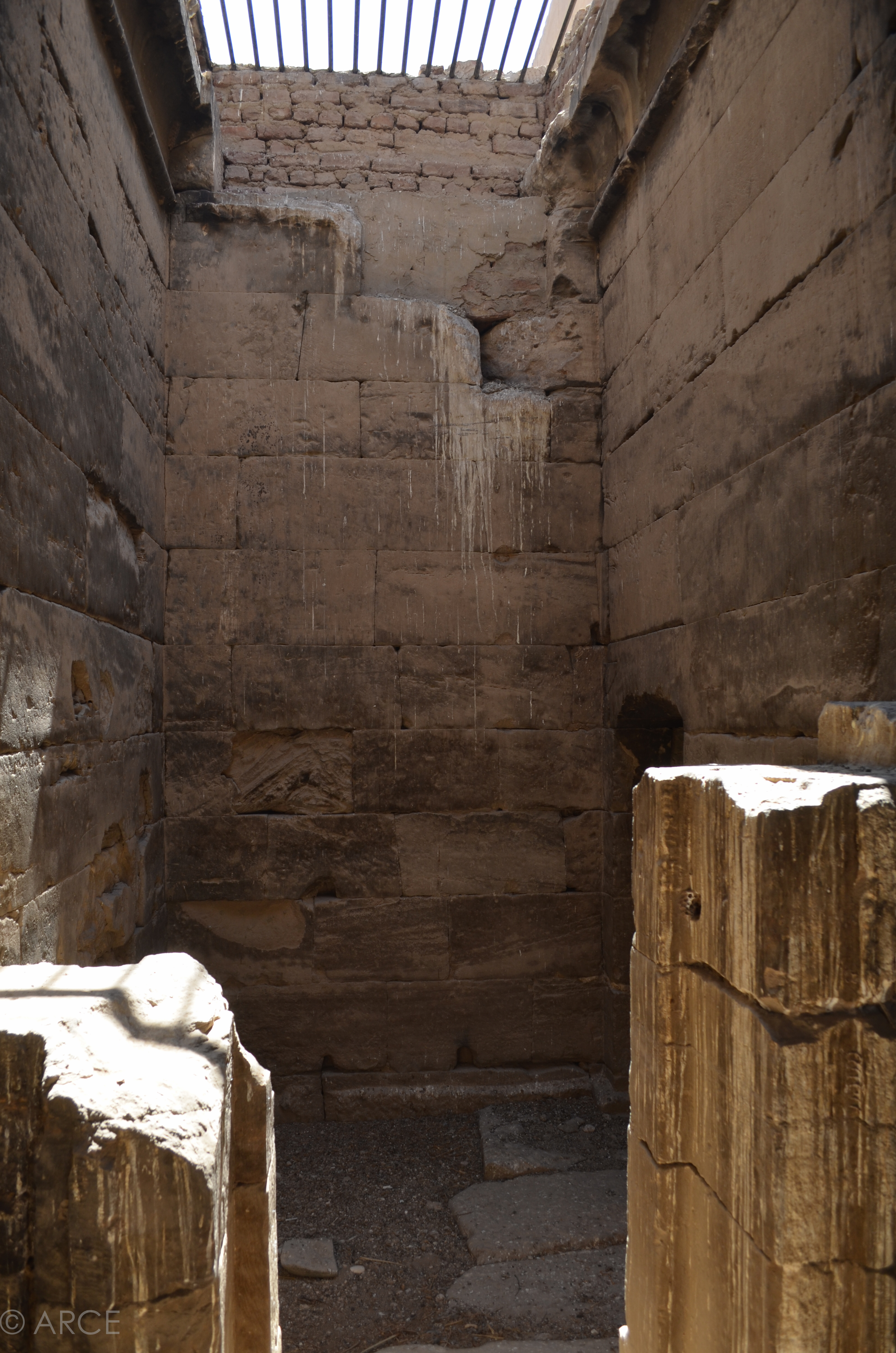   Egyptian monuments are often streaked with bat and bird excreta. While historic sites are frequently sealed to prevent infestations, the closure systems are rarely made of durable materials and are poorly maintained.  Image © ARCE, 2012    