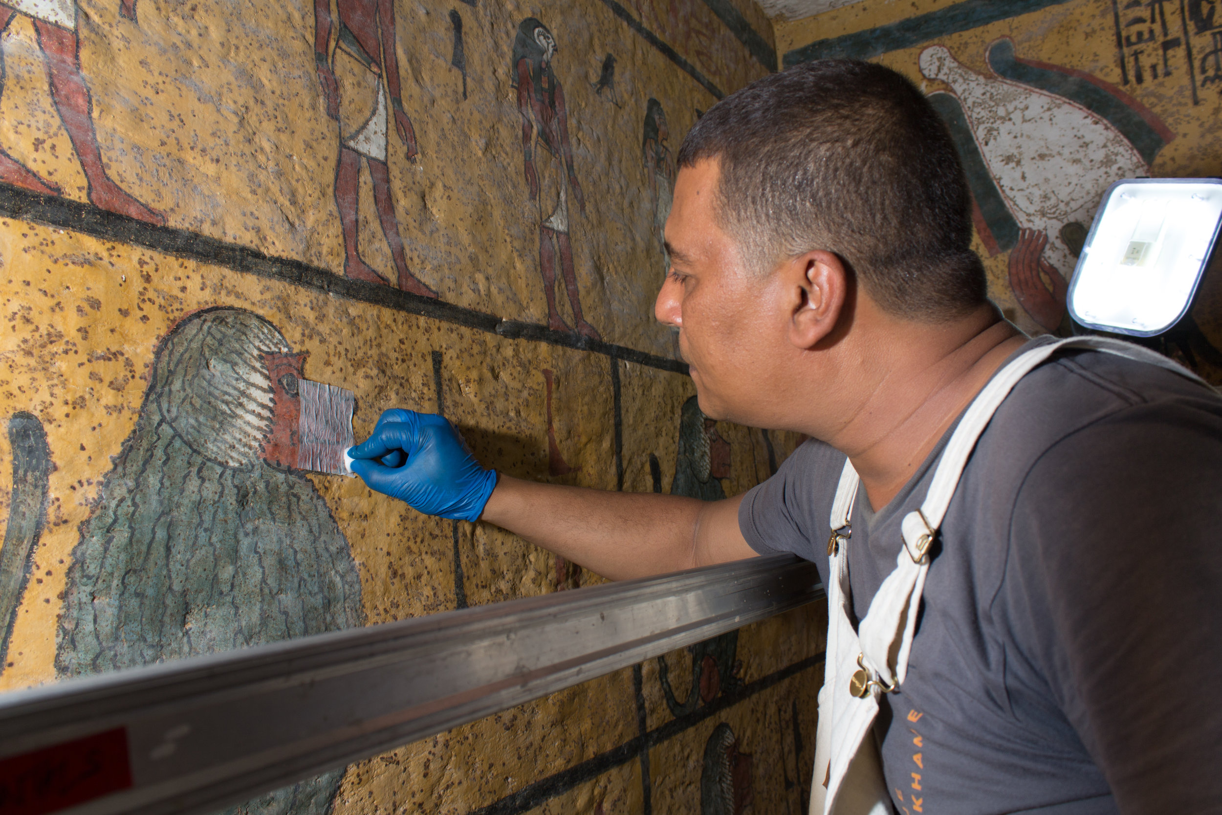  In a second step, a damp sponge was tamped over a thin layer of tissue to absorb remaining dust and lift it from the surface.&nbsp;  Image © J. Paul Getty Trust, 2016 