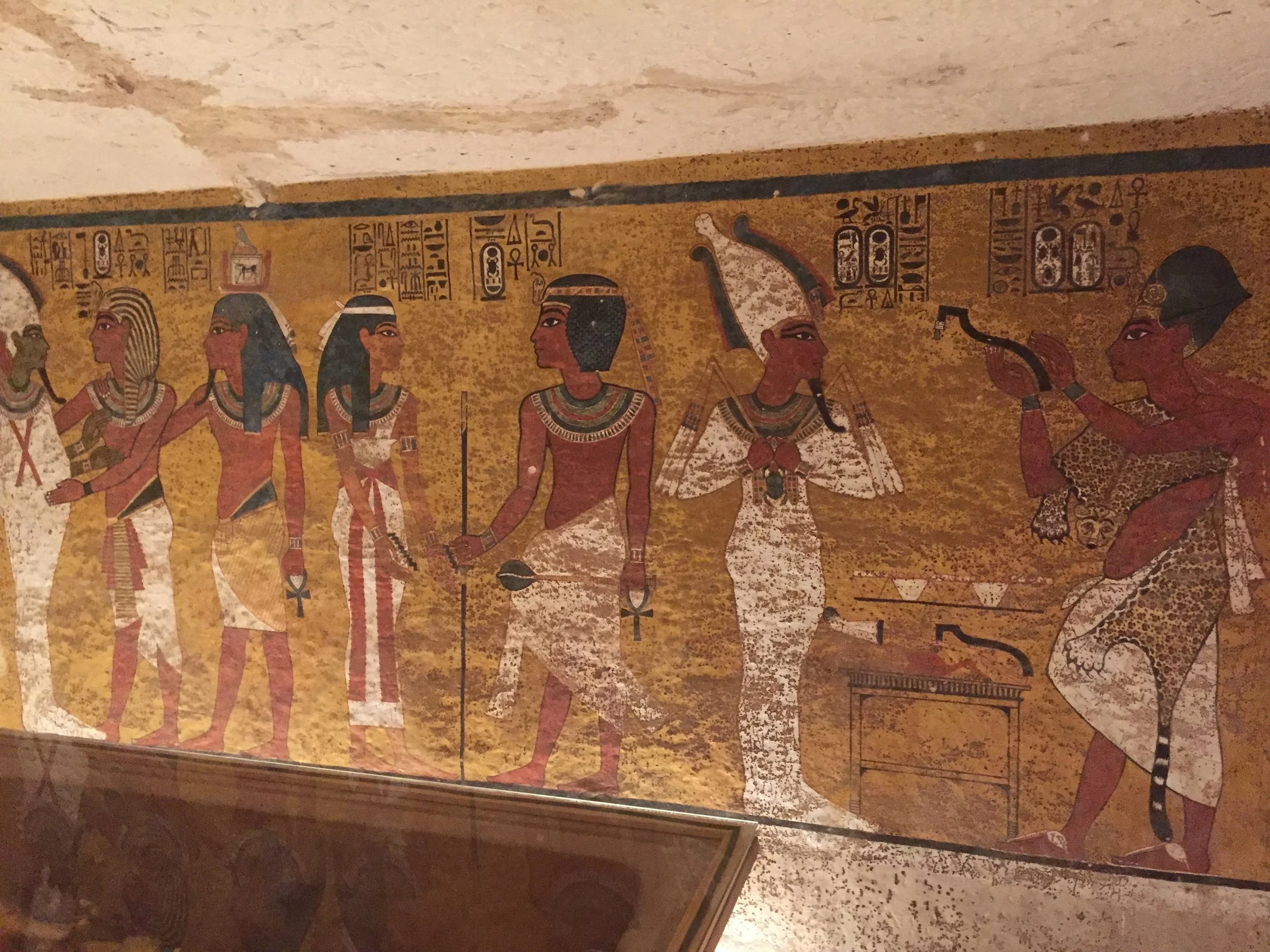  Iconography painted on the north wall of the burial chamber.&nbsp;Large figures in a style recalling the Amarna period are painted against a bright yellow background.&nbsp;  Image © J. Paul Getty Trust, 2017    