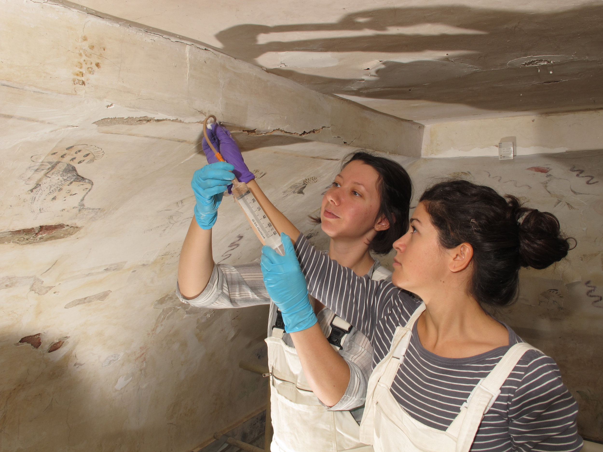  Pipettes, syringes, needles and catheters were used as required to inject the custom grout, stabilizing areas of detached plaster.  Image © Courtauld CWPD 