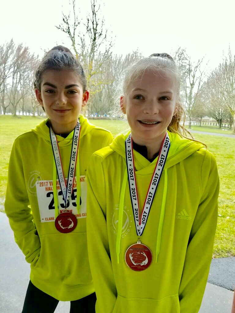 Kiley (left) and Katelyn (right) after running the Vancouver Lake Half Marathon, where they finished 1st and 2nd in their age group with times of 1:49:43 and 1:49:49.