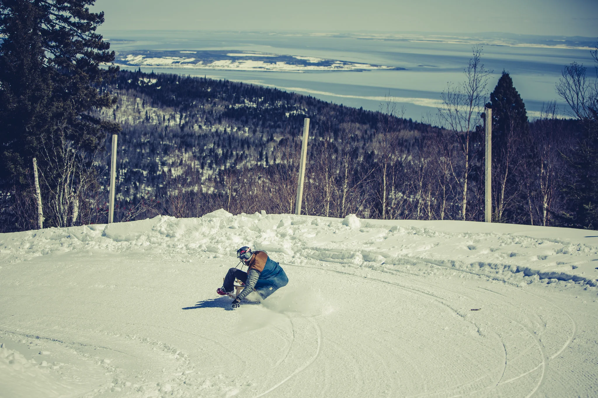 Pulling some G's around a turn on the rodeling track at LeMassif, QC