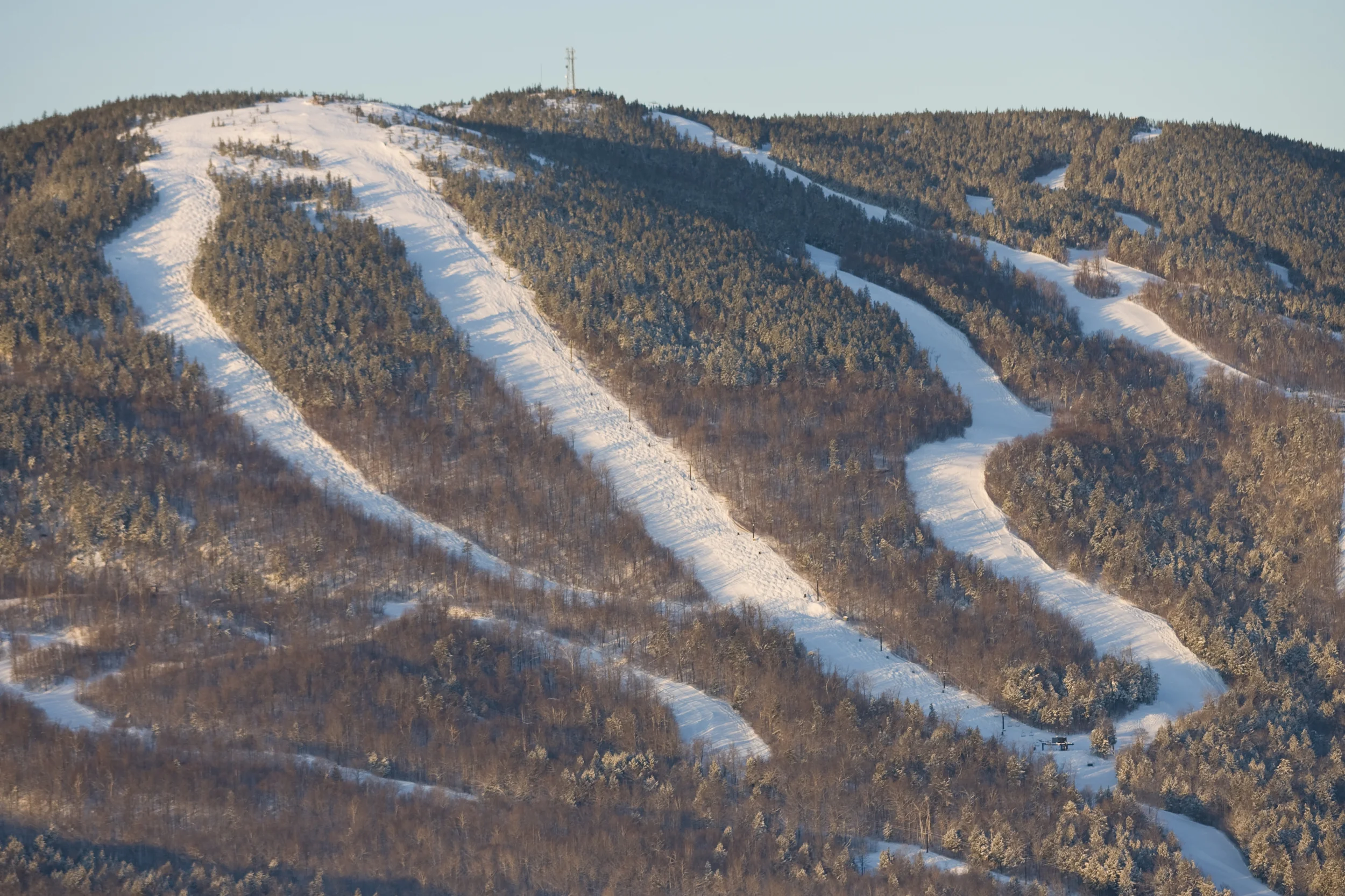 White Heat (center) - Sunday River, ME. The trail is marketed as the "steepest, longest, widest" trail on the East Coast.