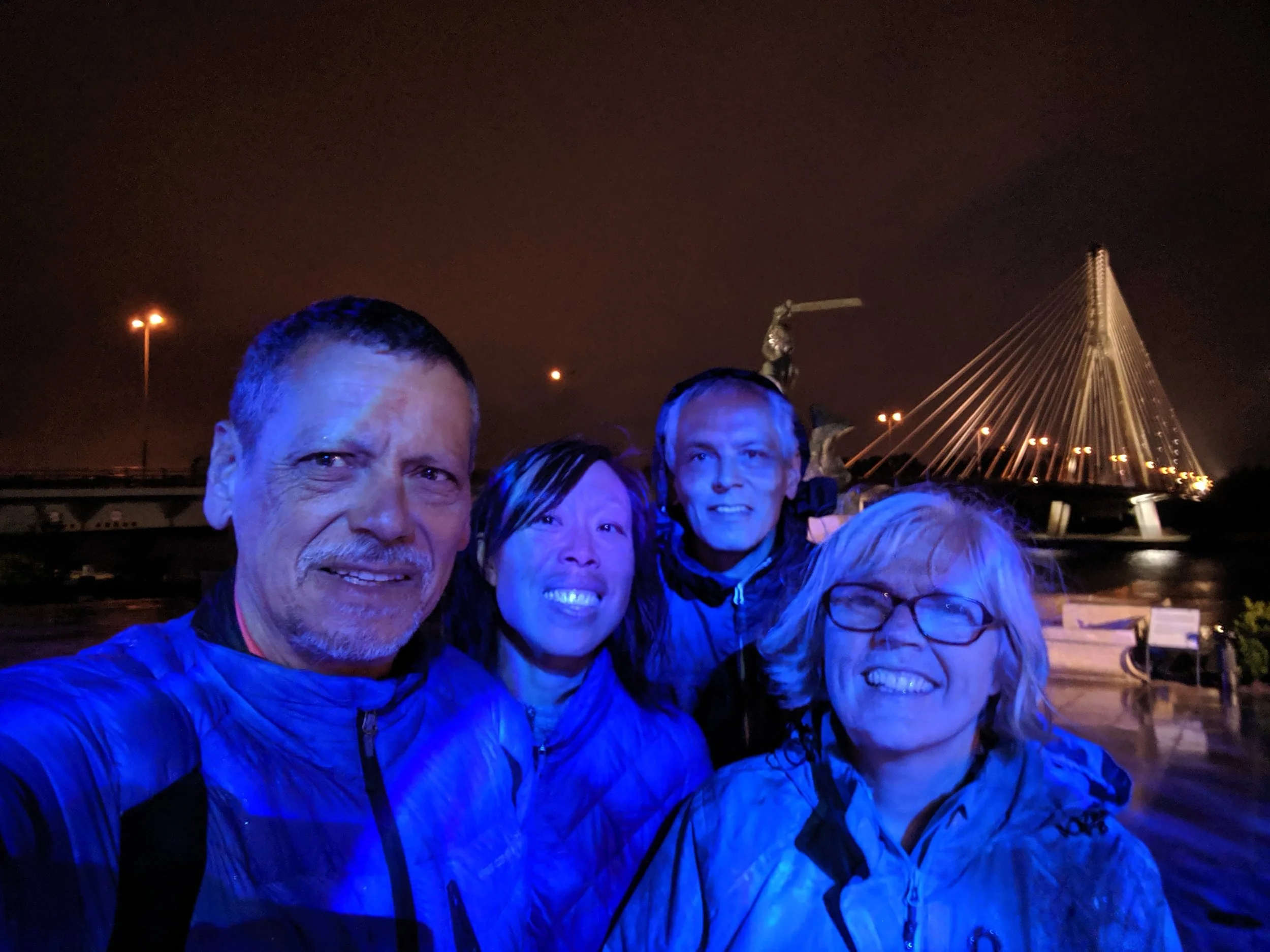 Wet evening after we arrived in Warsaw — Mark, Andrea, Chris and Sarah, by the Vistula (Wiswa) River.