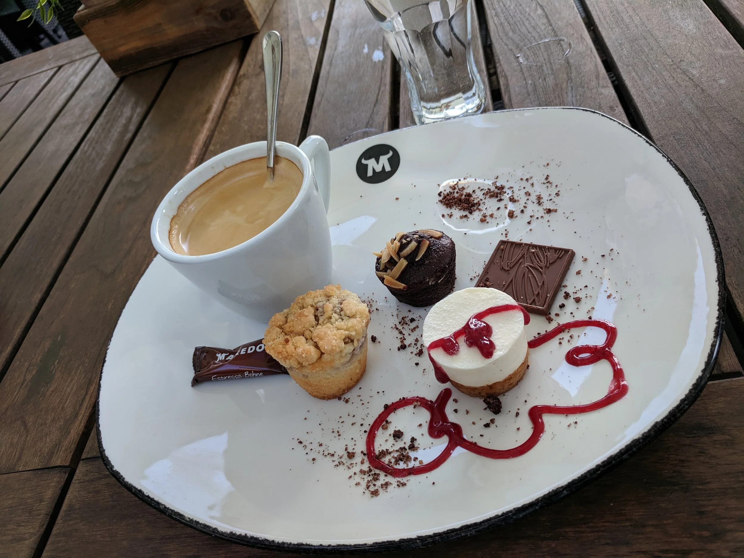 Espresso and bakery confections as an afternoon snack in Hamburg.