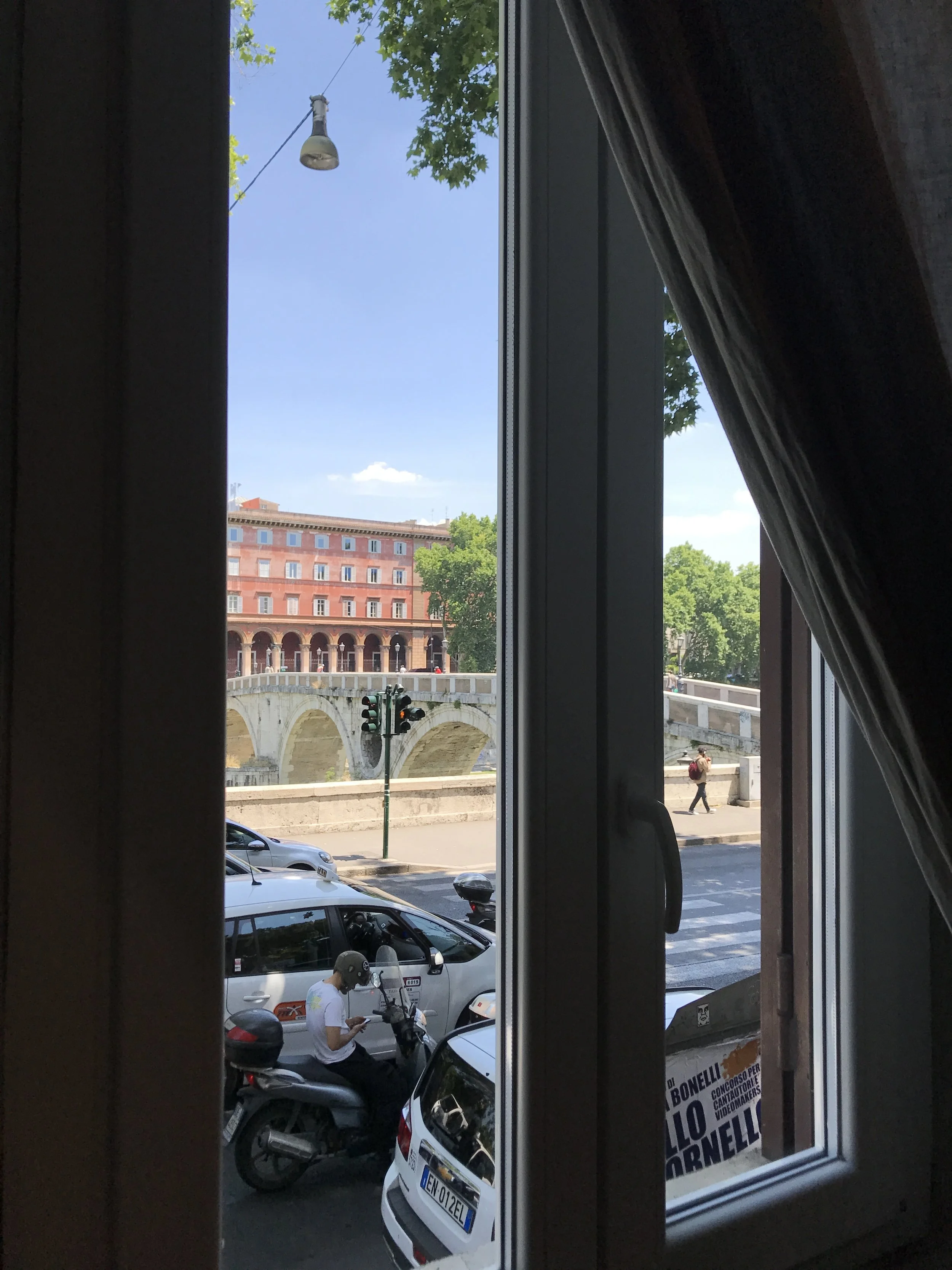  The view of the bridge across the Tiber from our bedroom river. It took us less than three minutes to get into the heart of Rome, and less than 30 seconds to get into the heart of Trastevere. 