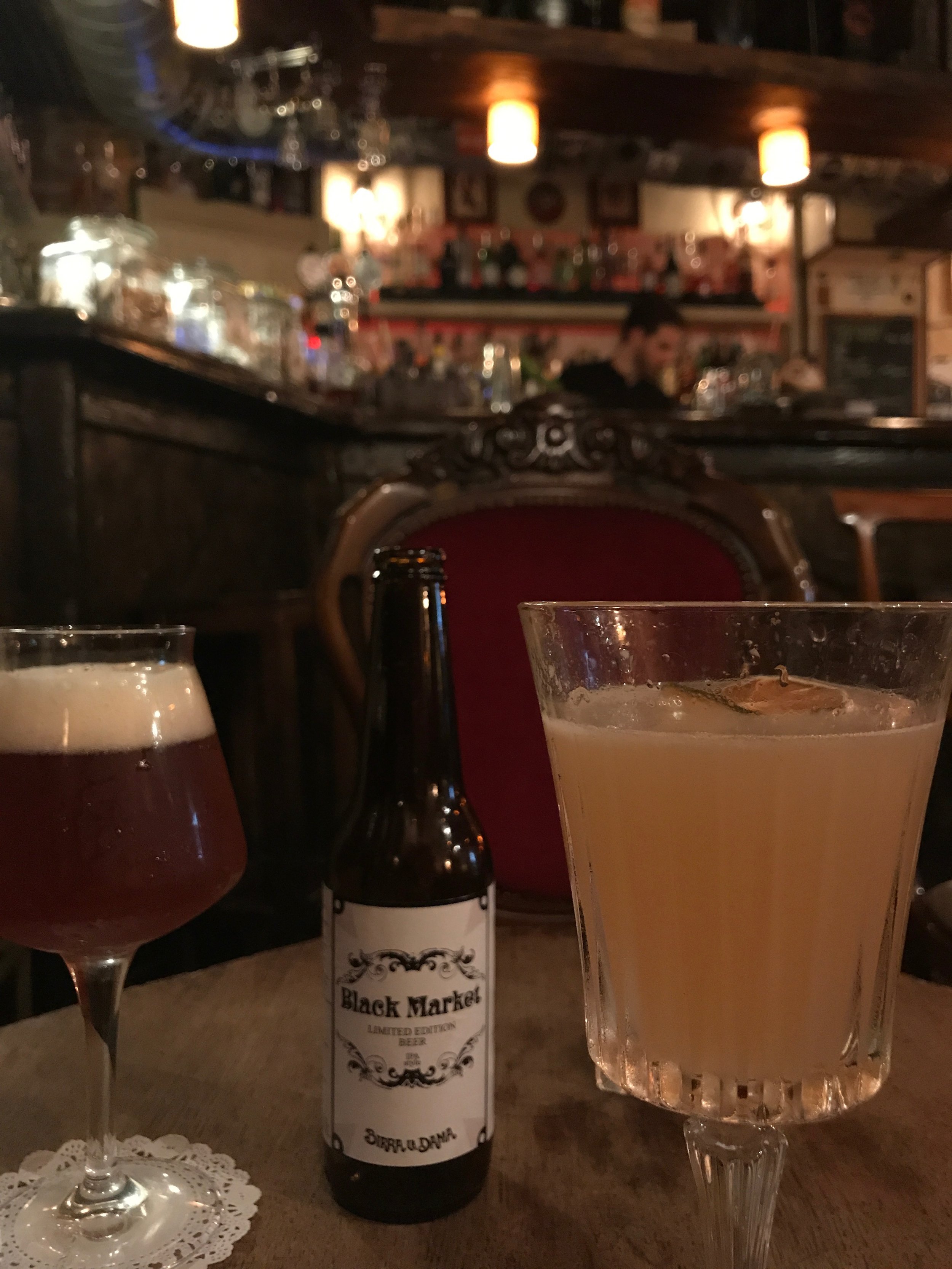  Ryan had a Black Market-specific beer, and I had a cocktail that included mezcal and a few ingredients I'd never heard of. (It was great!) 