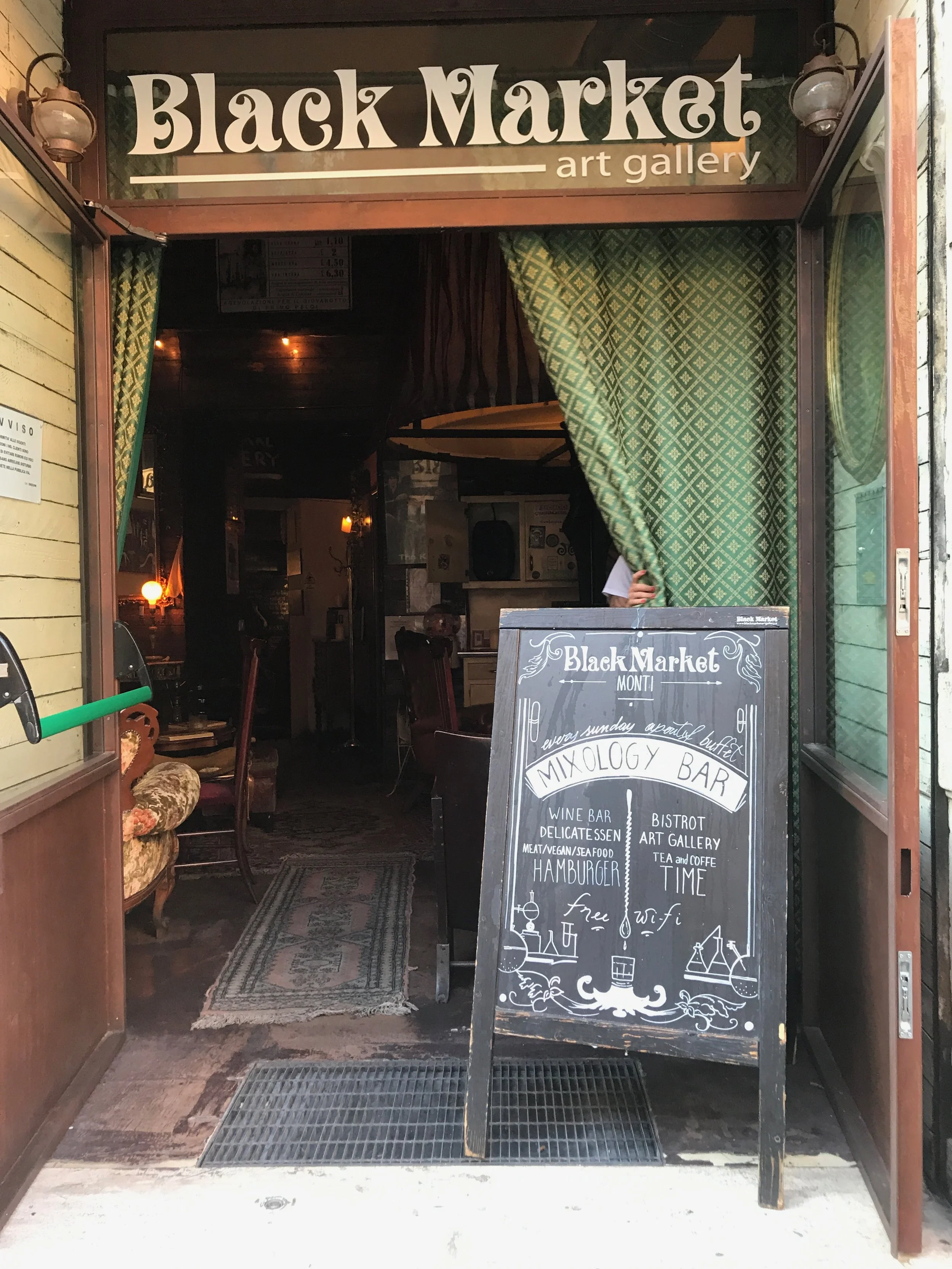  We kicked off our date night in Rome at Black Market, a hip cocktail bar near Rome's only Episcopal church, St. Paul's Within the Walls. 