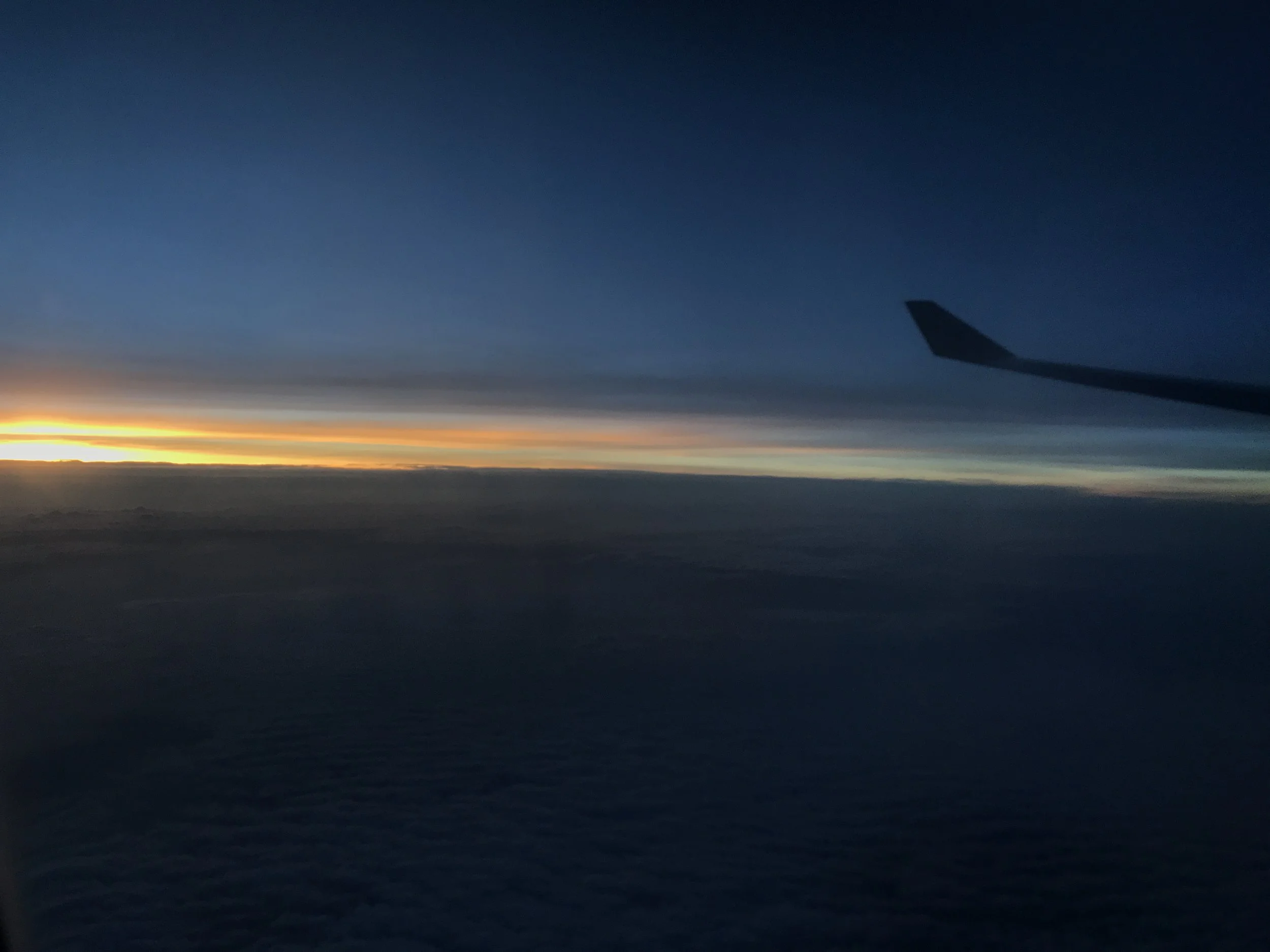  Watching the sun set while Ryan was playing level after level of Candy Crush and I was flipping my way through "The Time Traveler's Wife." (Horrible book, don't read.) 