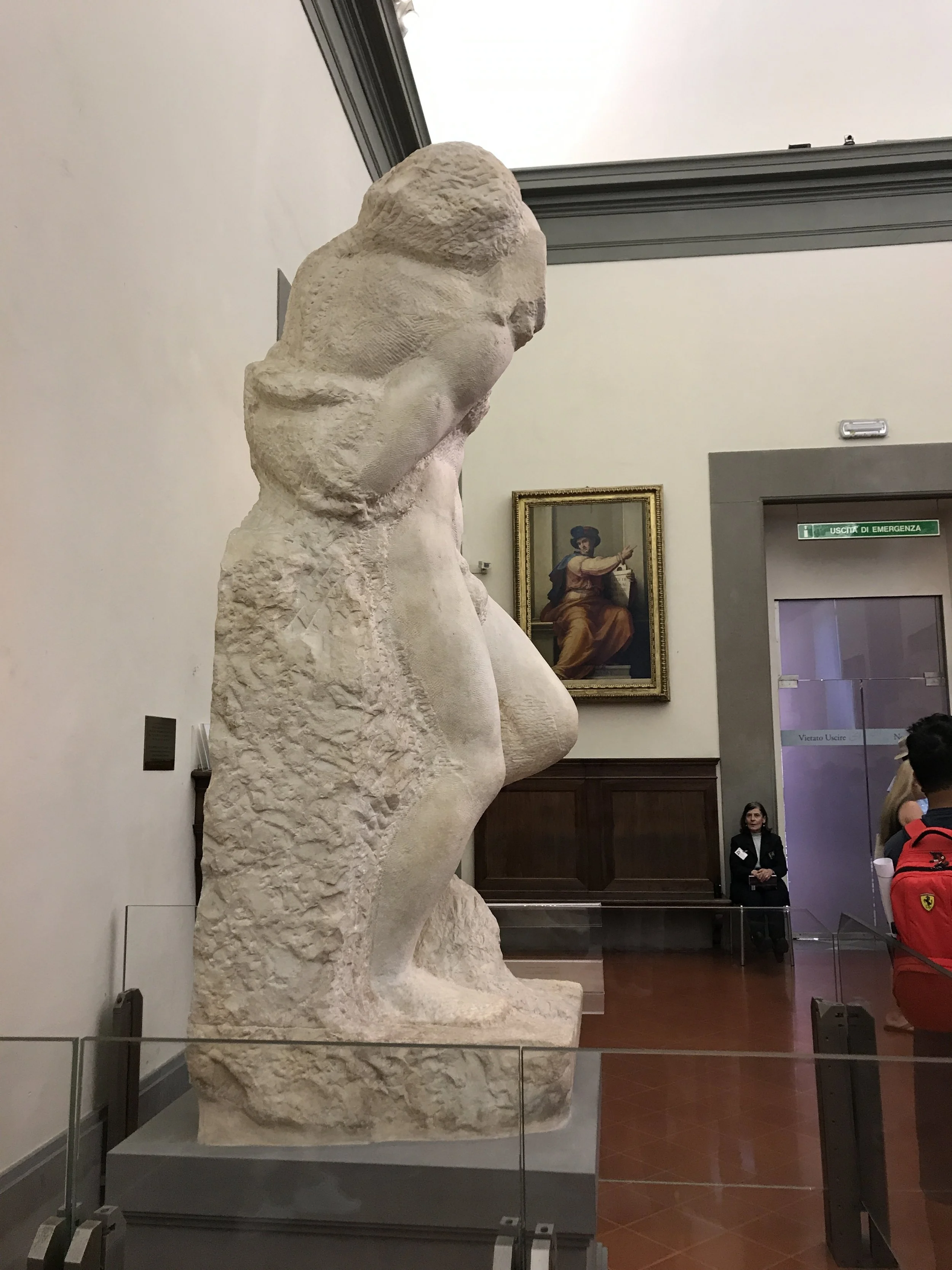  One of a series of partially finished Michelangelo sculptures. It was so neat seeing how Michelangelo worked his way through each block of marble; here, it looks as if the man is slowly emerging from the rock. 
