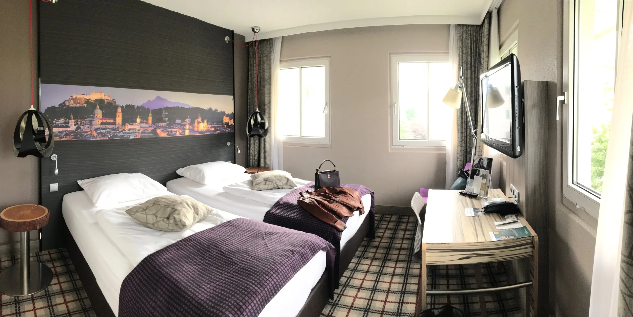  This was one of the first "actual" hotels of our honeymoon, so as unappreciative as it might sound toward our (lovely) bed and breakfasts in Italy and Switzerland, we were overjoyed to have A/C! We also had a little Nespresso that came with five or 