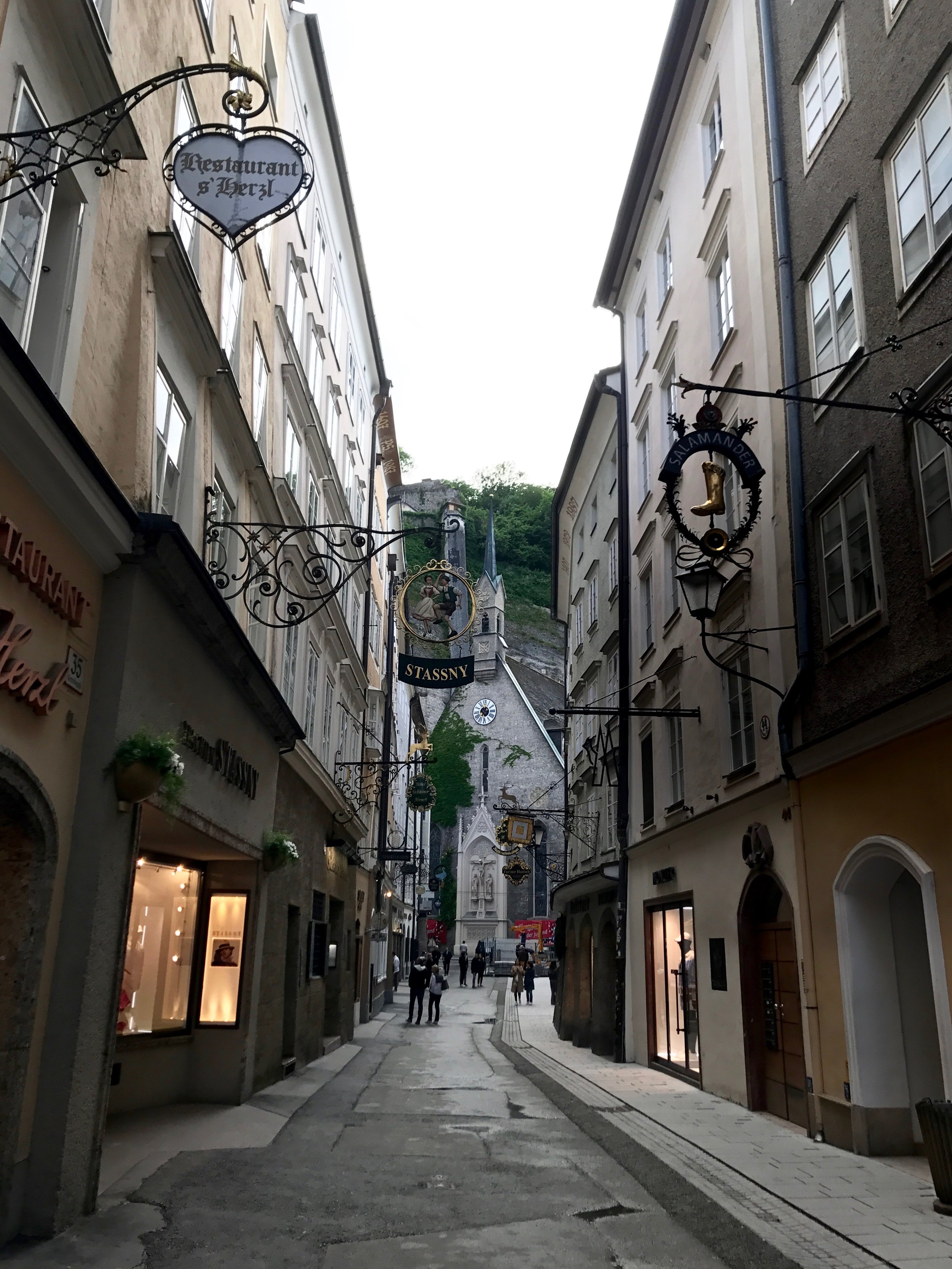  Yet another narrow shopping street. It started to rain right after we took this photo, so we ducked for cover in Alchimiste Belge—a smoky Belgian bar with an owner so perplexed by Ryan's request for a beer list that he laughed and said, "My friend, 