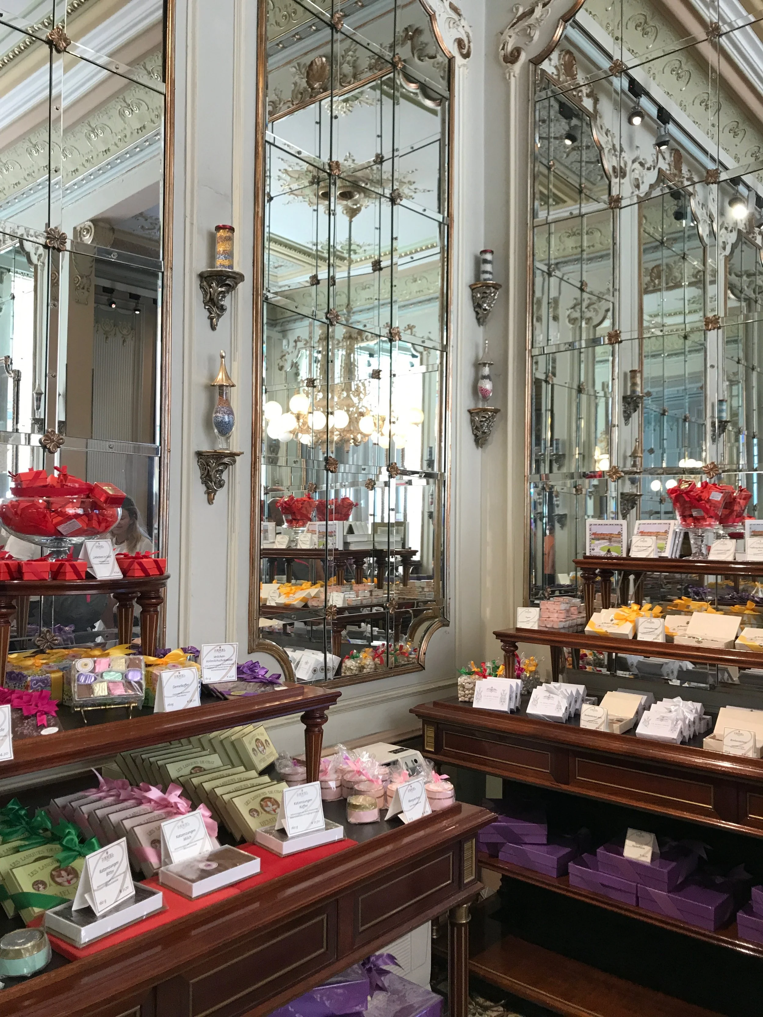  Another shot of Demel. We had our final breakfast in Vienna upstairs in what seemed like an old living room or lounge, with its almost Parisian décor and poufs and curved footed tables and gilded mirrors. I finally tried an apfelstrudel, and Ryan go