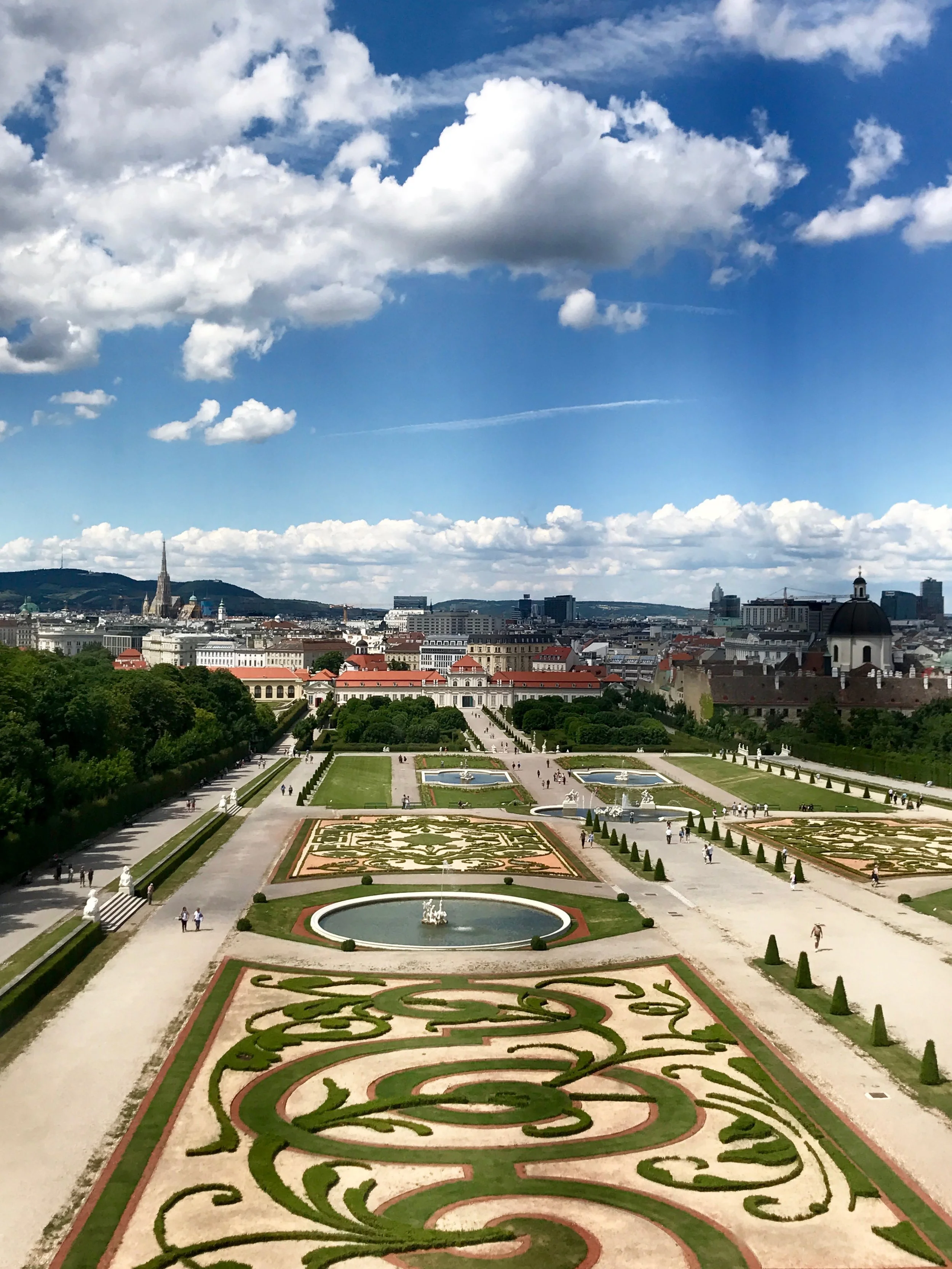  Belvedere, a multi-part museum housed in the beautiful and expansive Belvedere Palace, whose gardens sprawl in marble steps, elegant fountains, trimmed almost-maze-like hedges, and curly flower designs. 