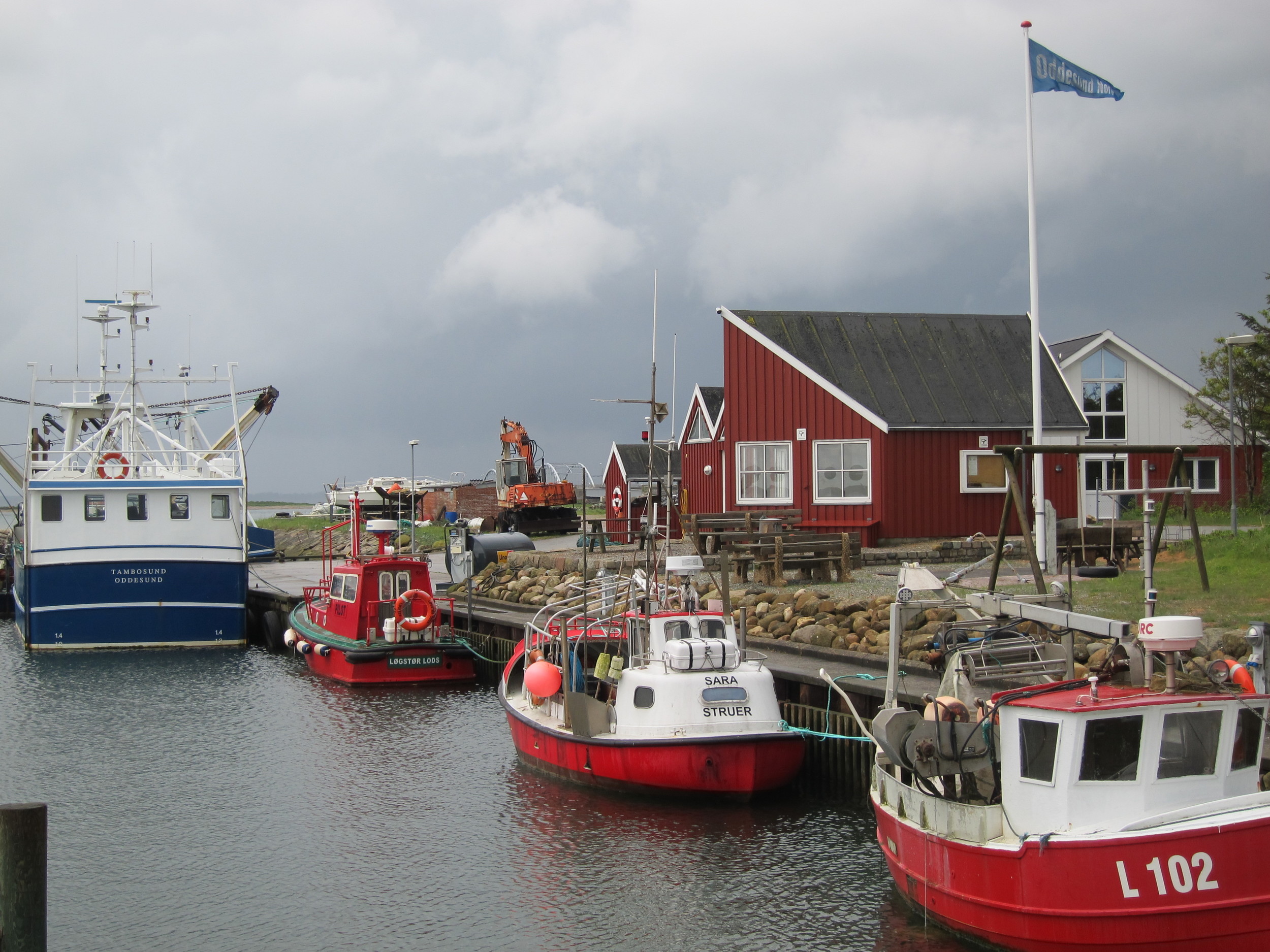 Fishing boats in a tiny harbor town on the island of Jutland, Denmark. 