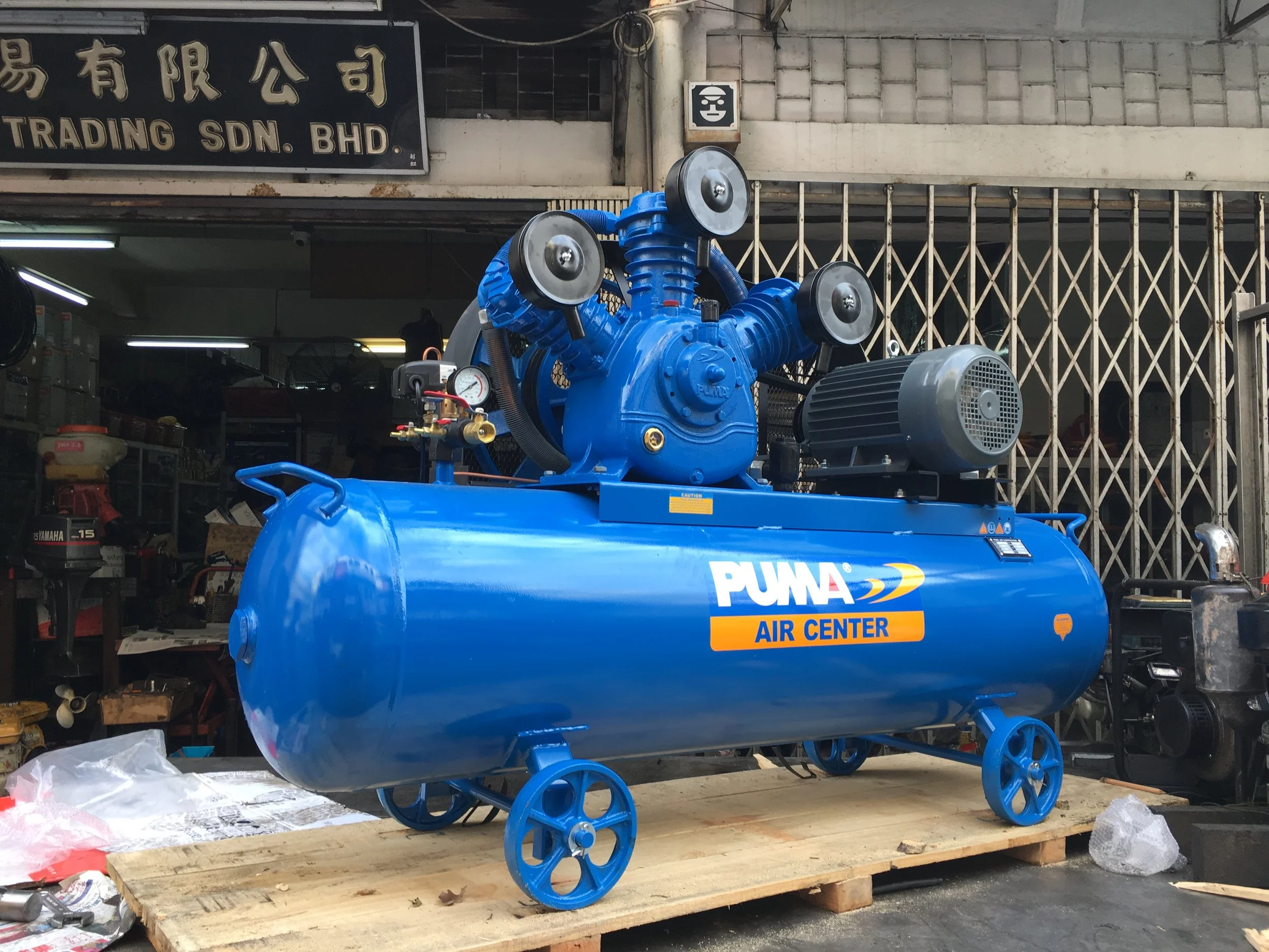 A Puma PK100300 10HP Air Compressor, with a tank capacity of 304L and a Puma 3 phase motor.