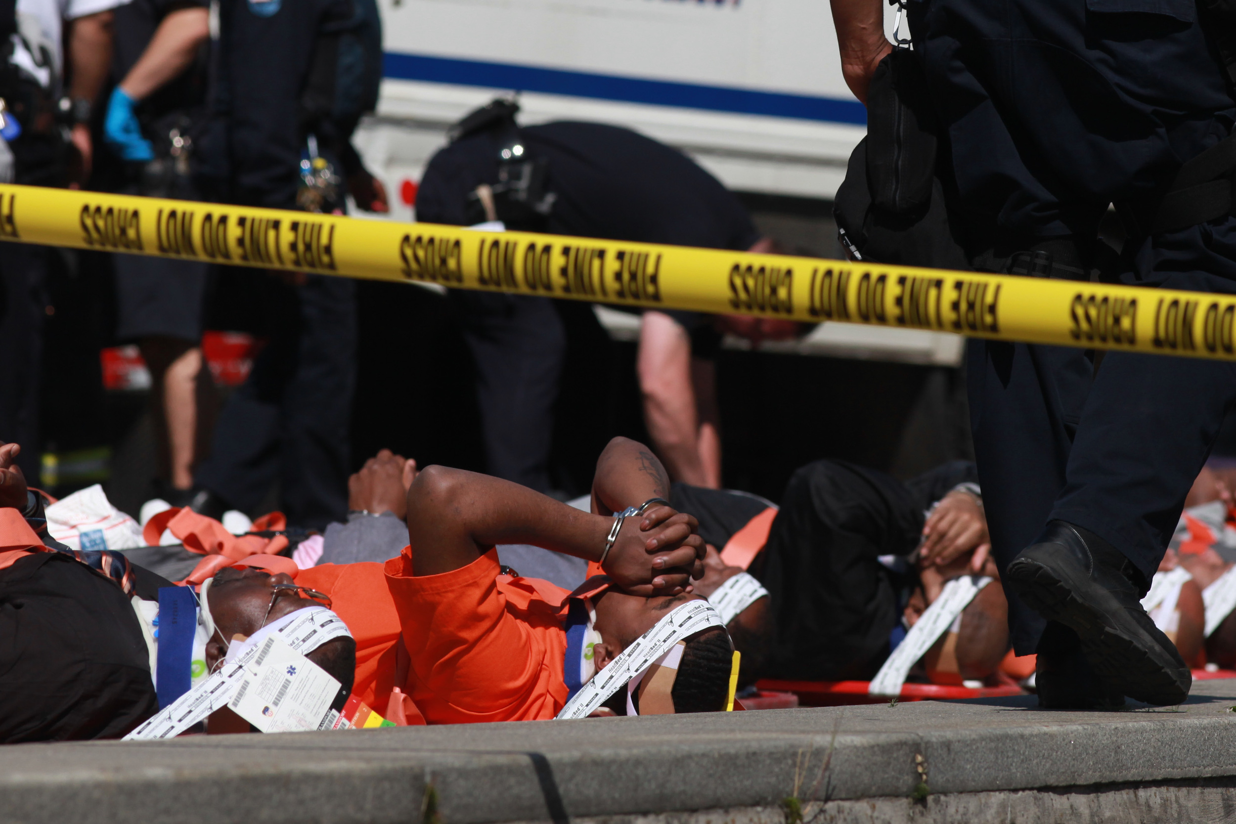  Inmates are laid out after a NYC Corrections bus accident on the ramp to the Manhattan Bridge. 