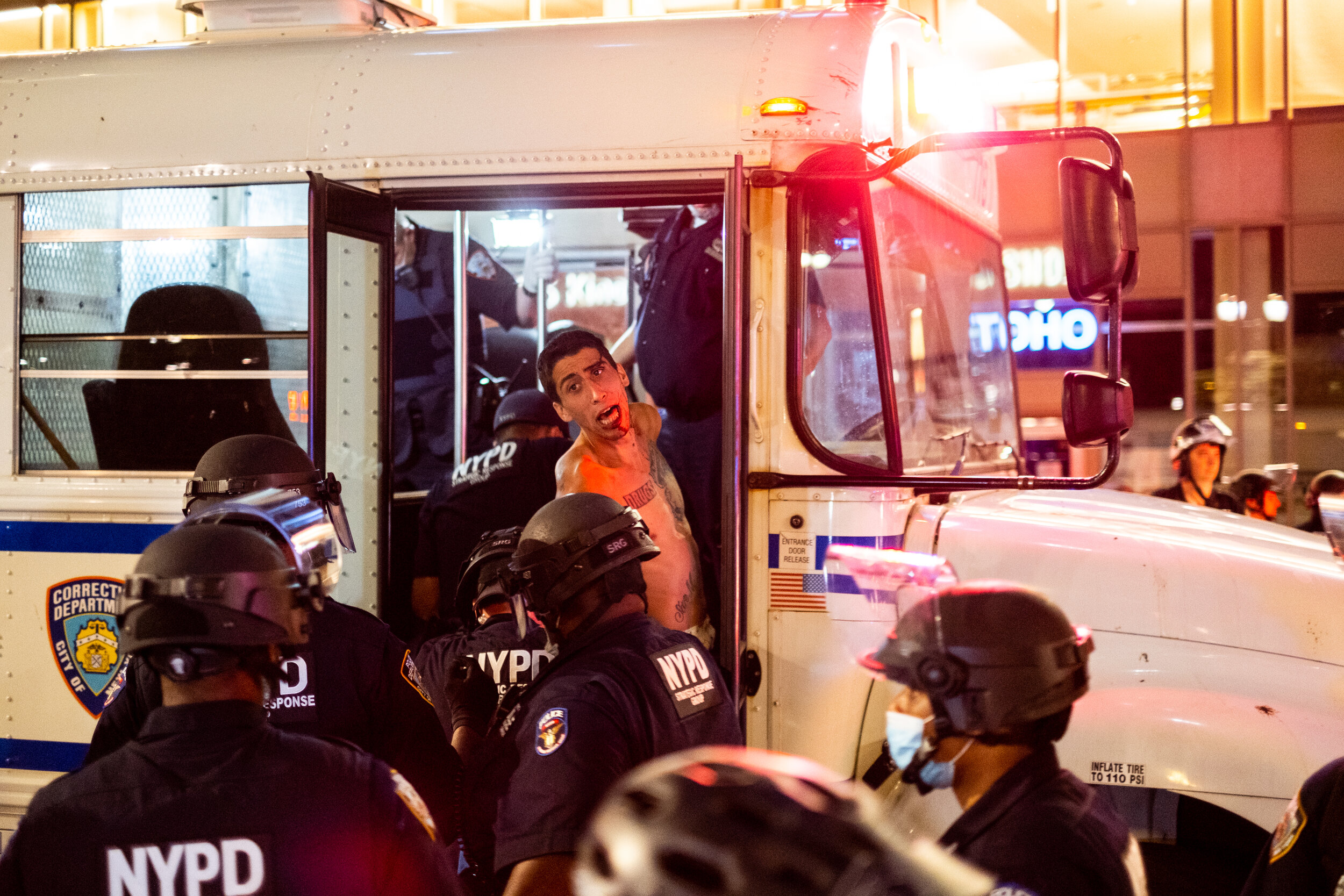  June 1, 2020: New York, NY -   A man is detained by police during widespread looting in midtown Manhattan after George Floyd was killed while being detained by Minneapolis police on May 25.  