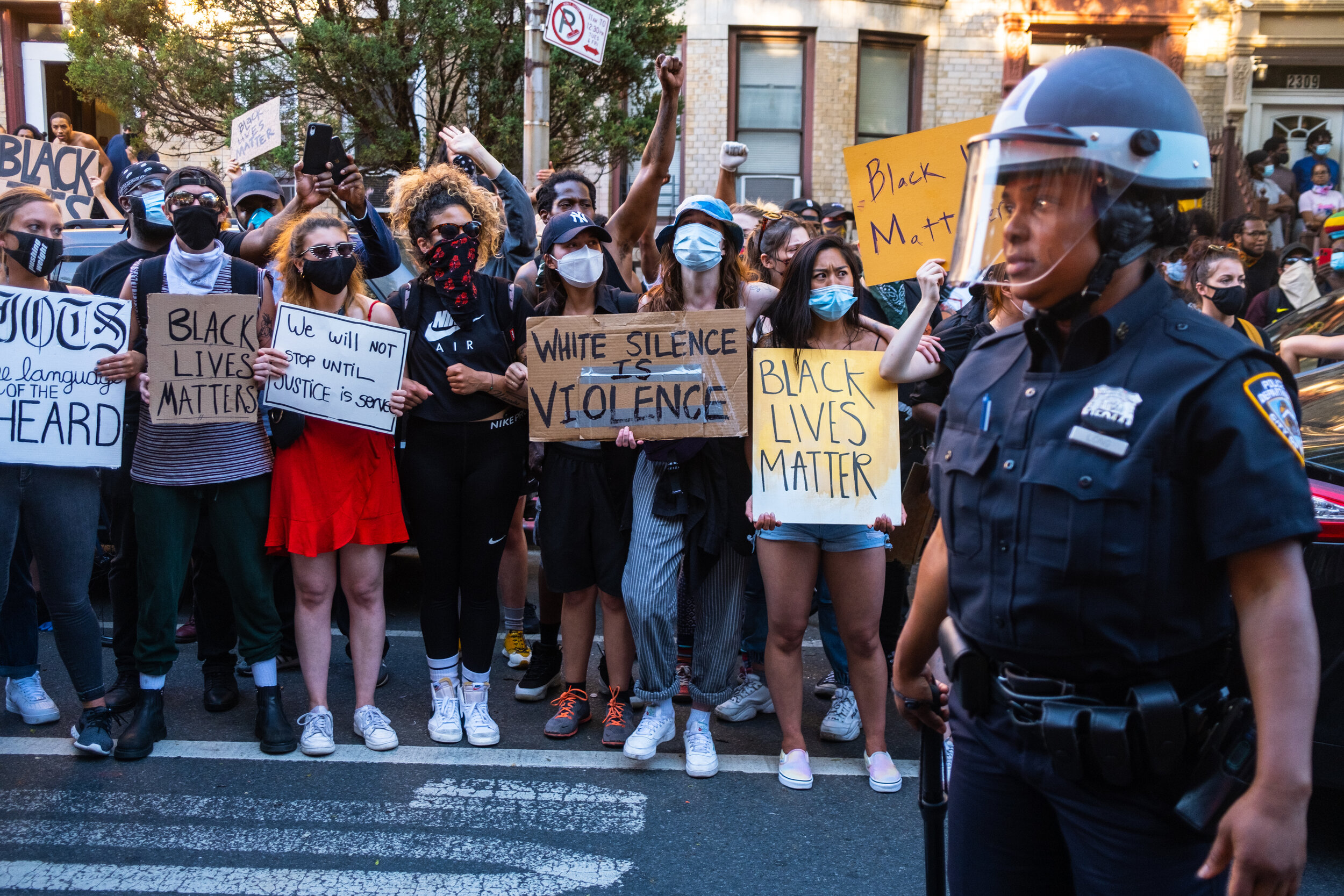  May 30, 2020: New York, NY -   Protesters clash with NYPD officers in Flatbush, Brooklyn after George Floyd was killed while being detained by Minneapolis police on May 25.  