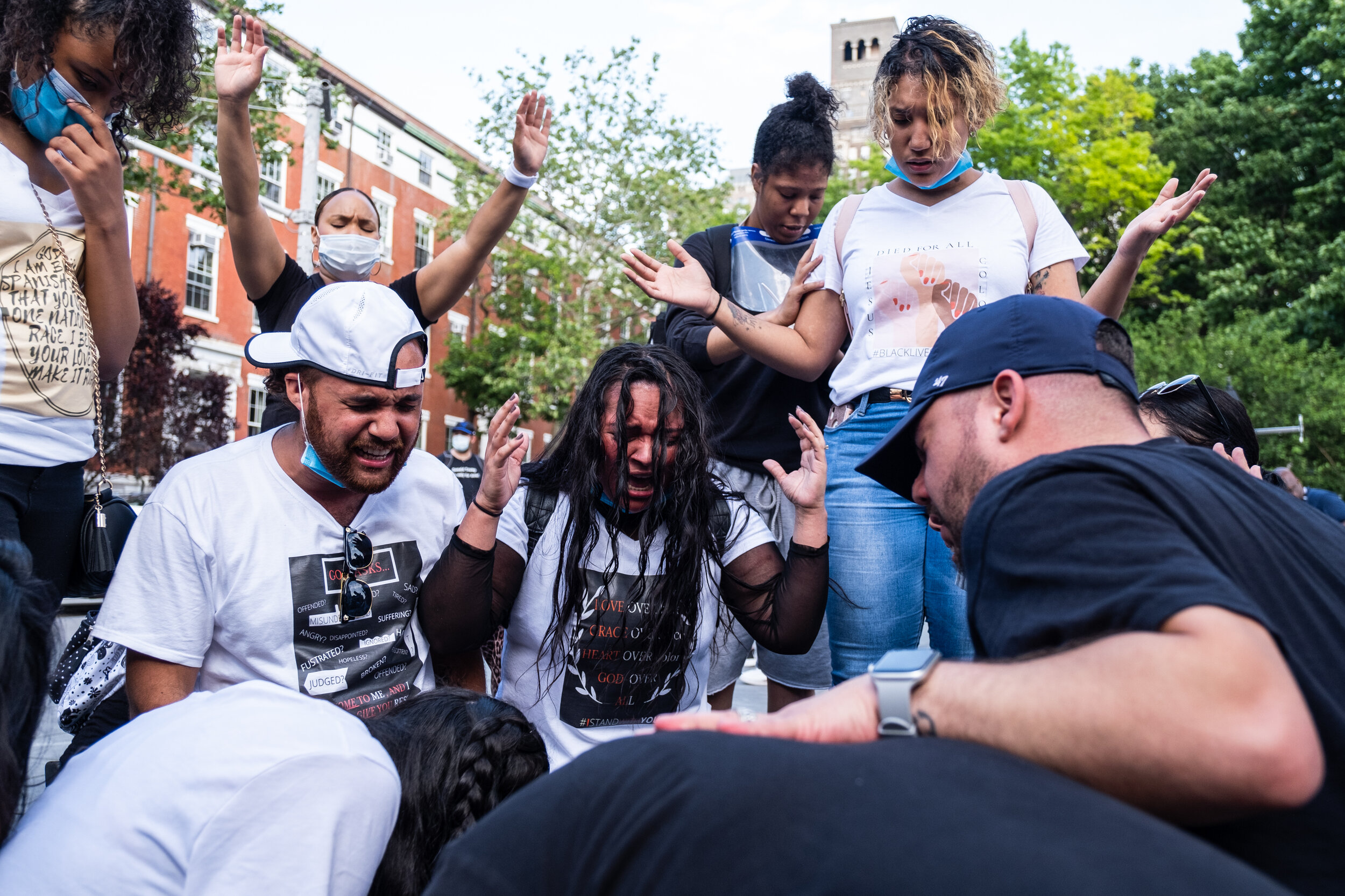  June 6, 2020: New York, NY -   A prayer group in Washington Square Park during a protest after George Floyd was killed while being detained by Minneapolis police on May 25.  